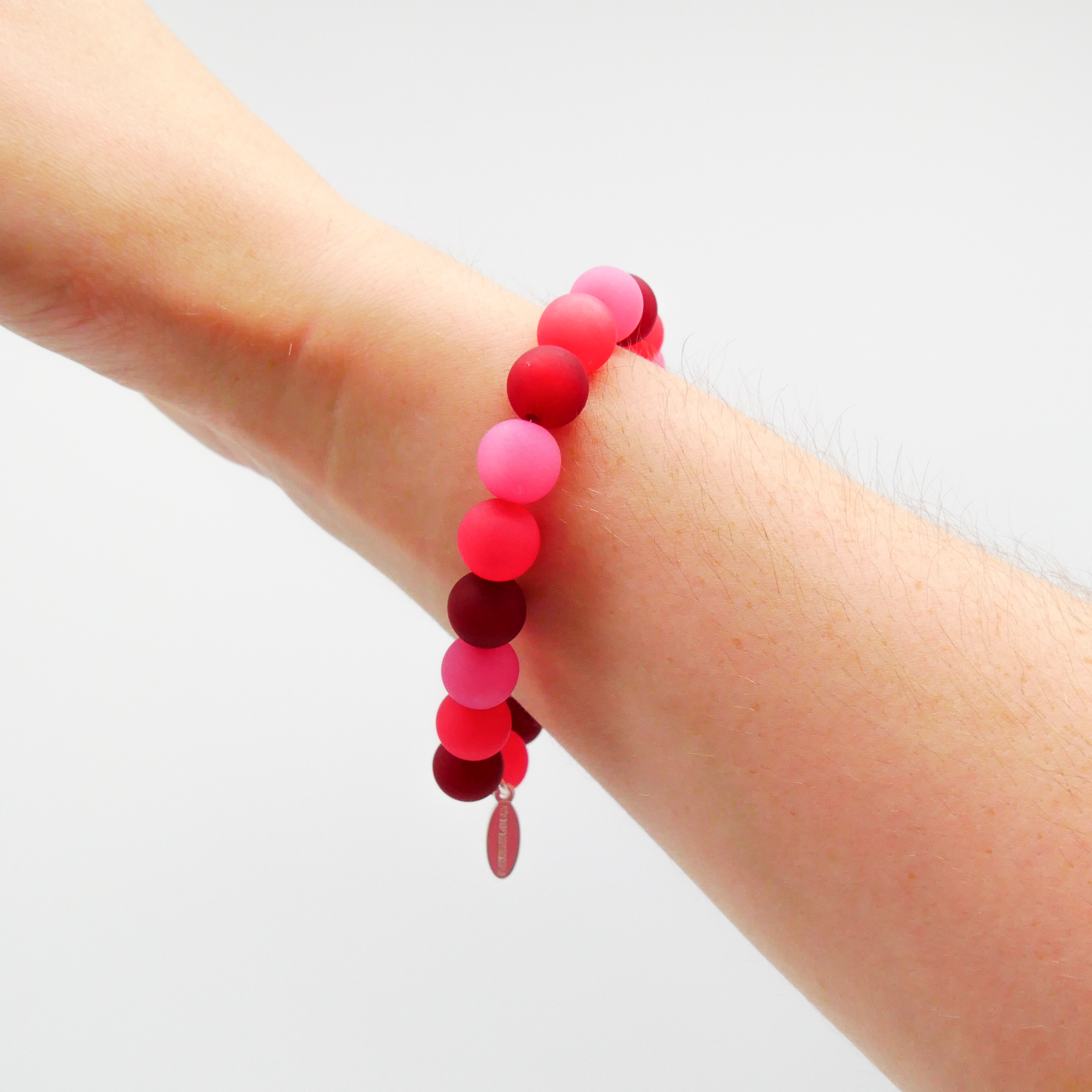 "Color Explosion" Armband auf Gummi Polarisperlen ø 10 mm, dunkelrot "Color Explosion" Armband auf Gummi Polarisperlen ø 10 mm, dunkelrot