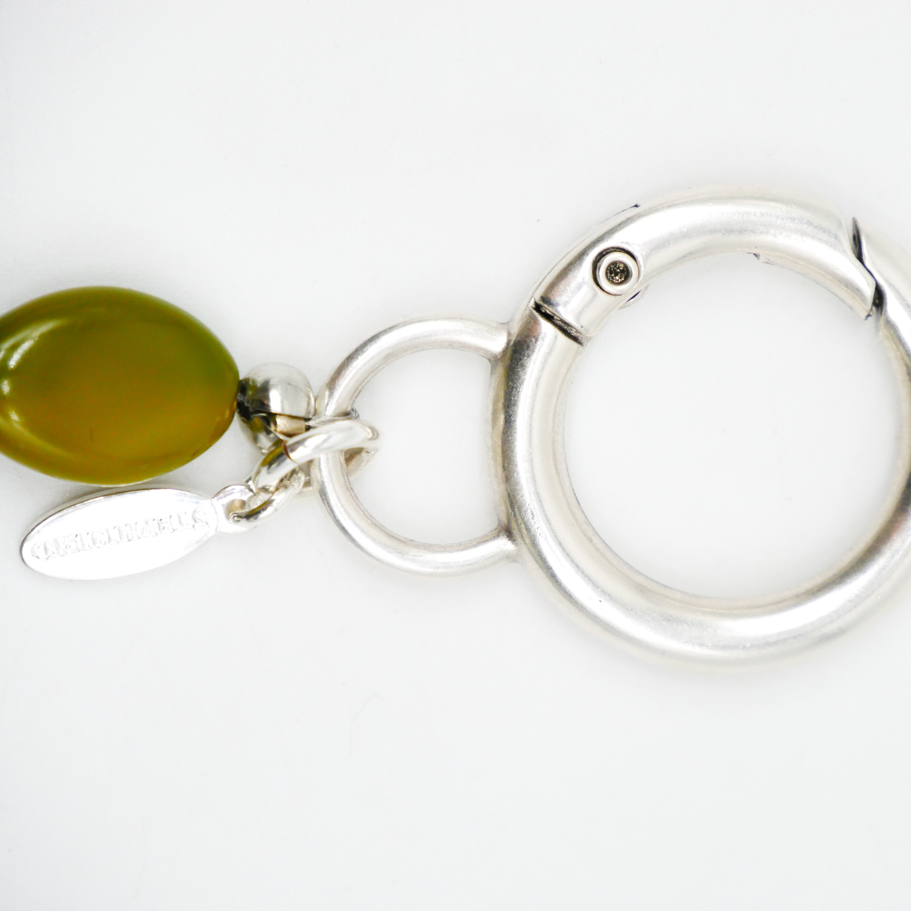 "Lucky Pendant" Anhänger, 1 Strang Hornperle, Keramikscheibe und Quaste "Lucky Pendant" Anhänger, 1 Strang Hornperle, Keramikscheibe und Quaste