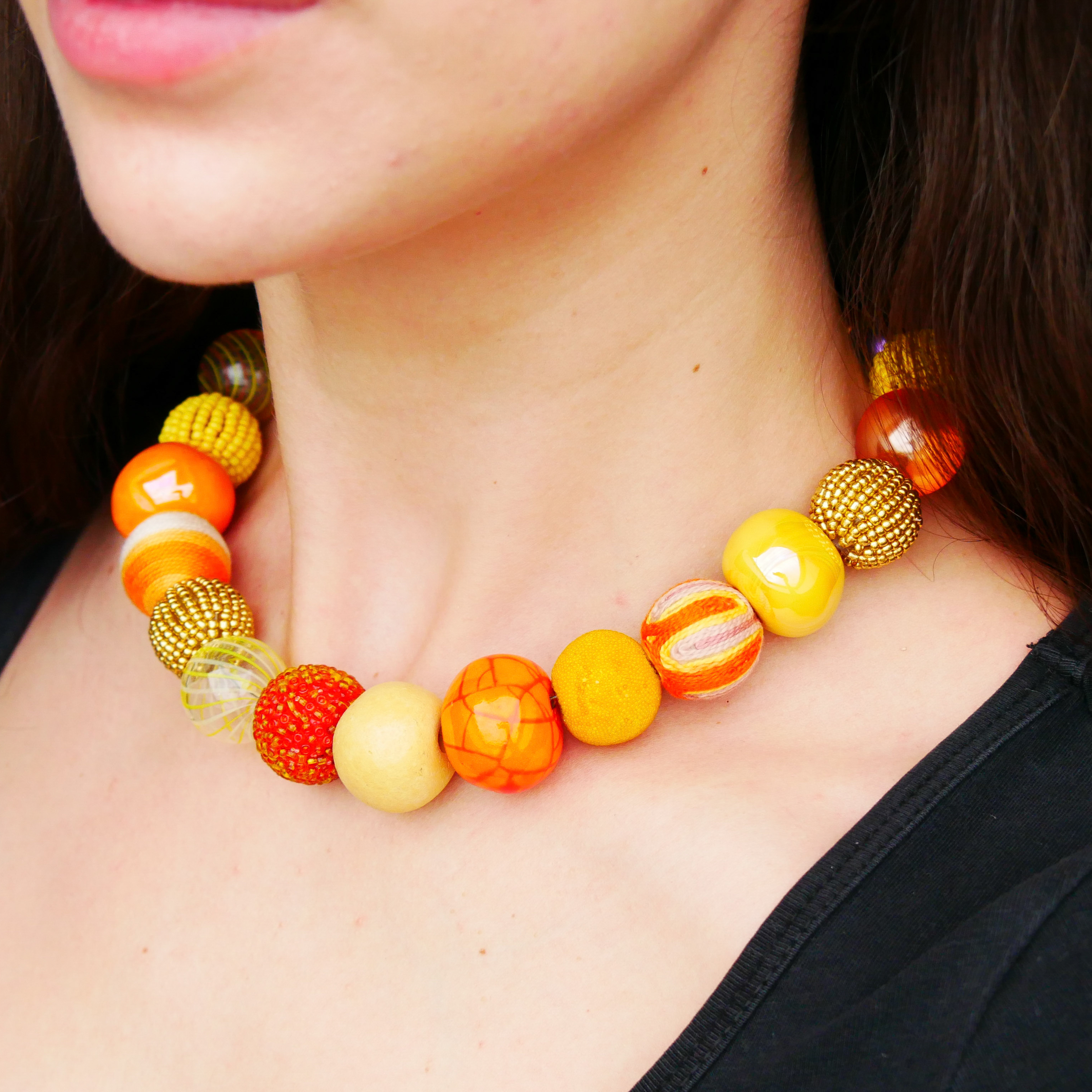 "Bollywood" Kette Ø ca. 20 mm, gelb-orange