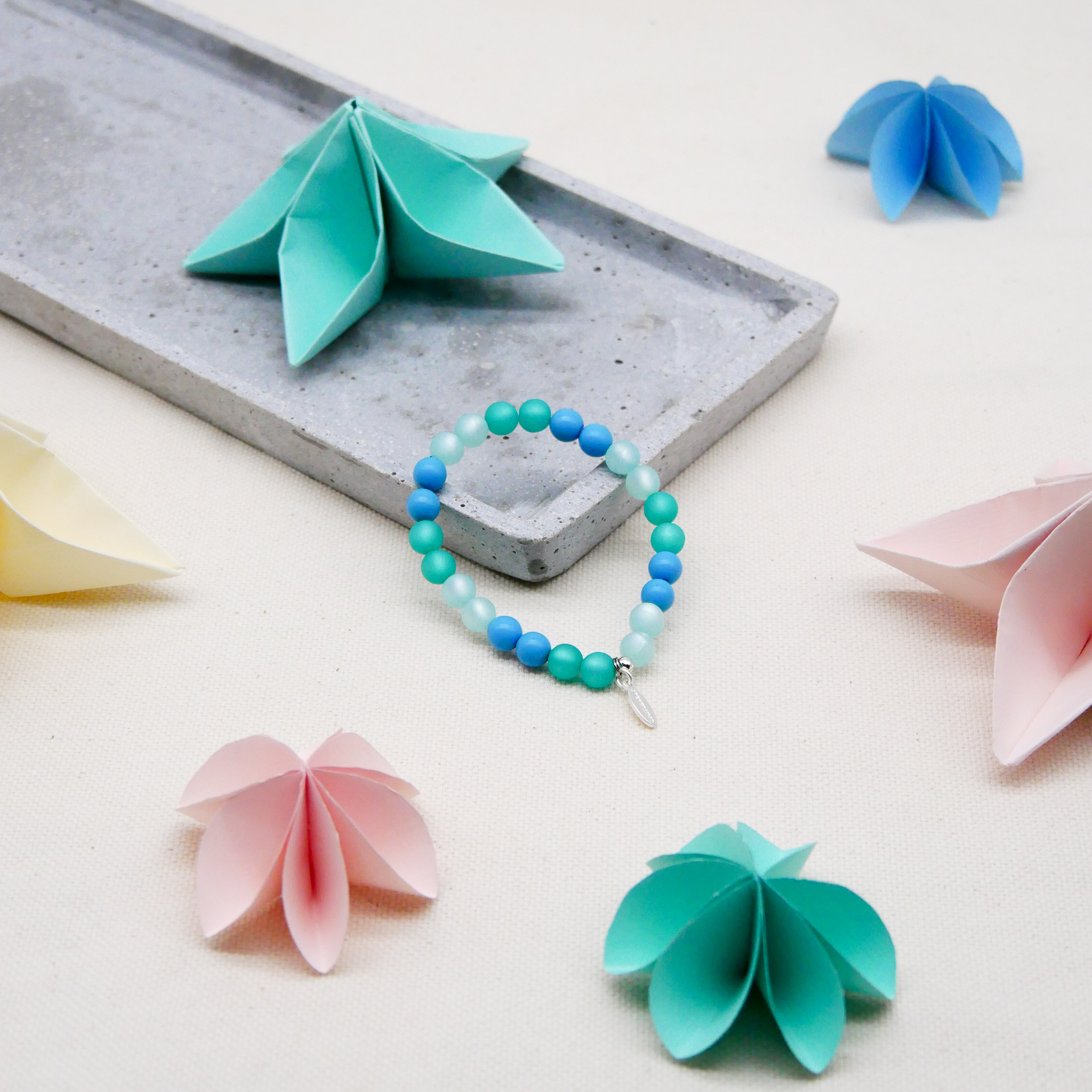  Color Explosion, Armband auf Gummi Ø 8 mm, Glas- und Polaris Perlen, Neptun türkis