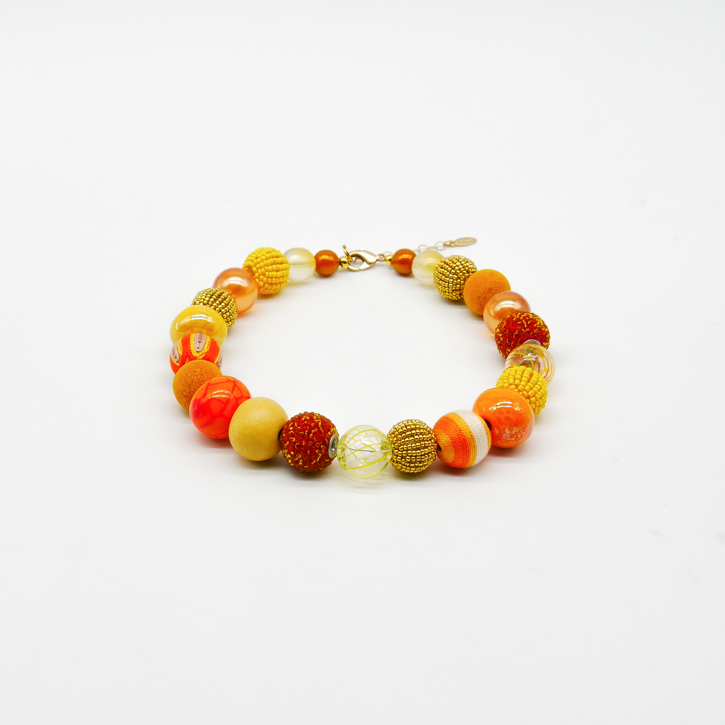 "Bollywood" Kette Ø ca. 20 mm, gelb-orange