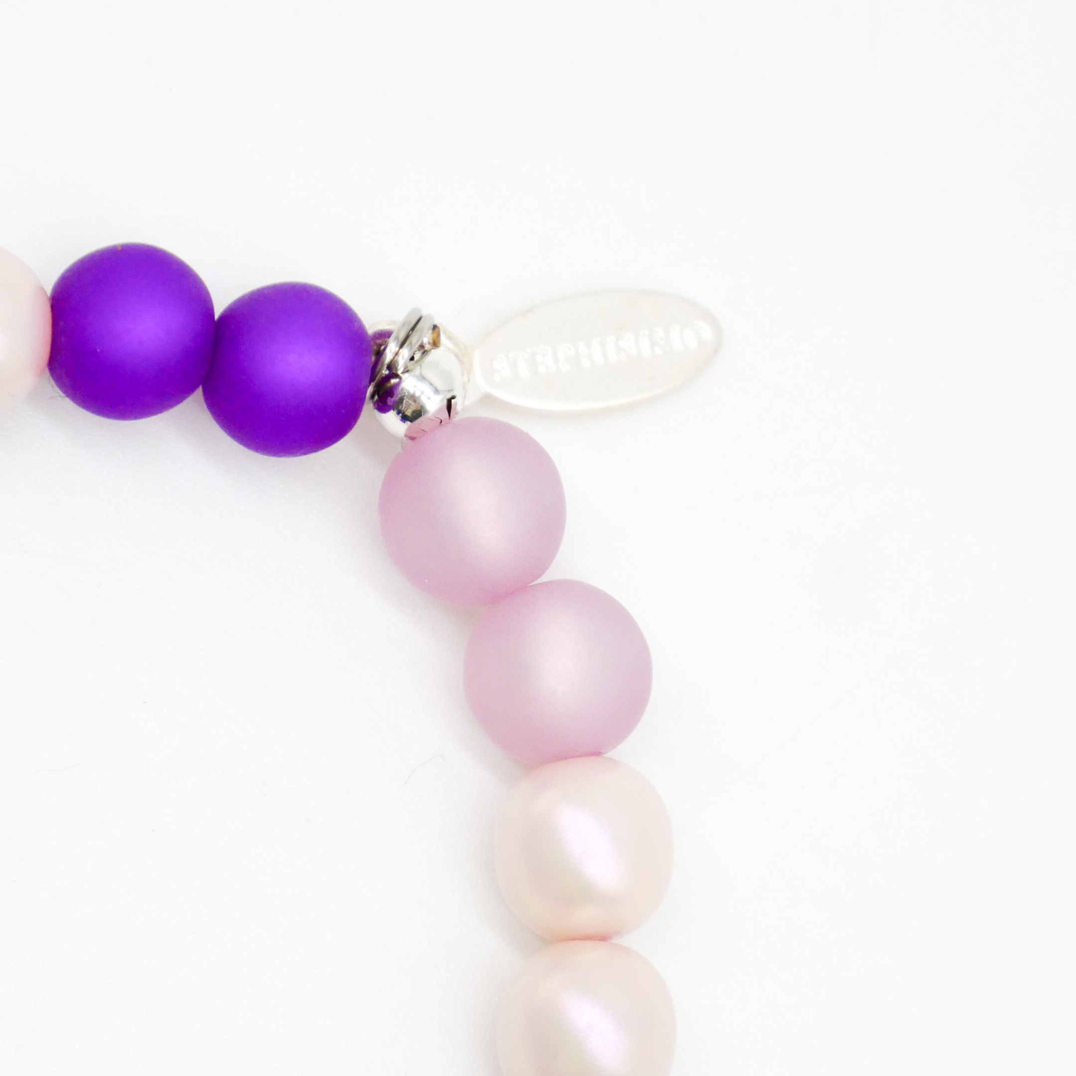  Color Explosion, Armband auf Gummi Ø 8 mm, Glas- und Polaris Perlen, Saturn lila