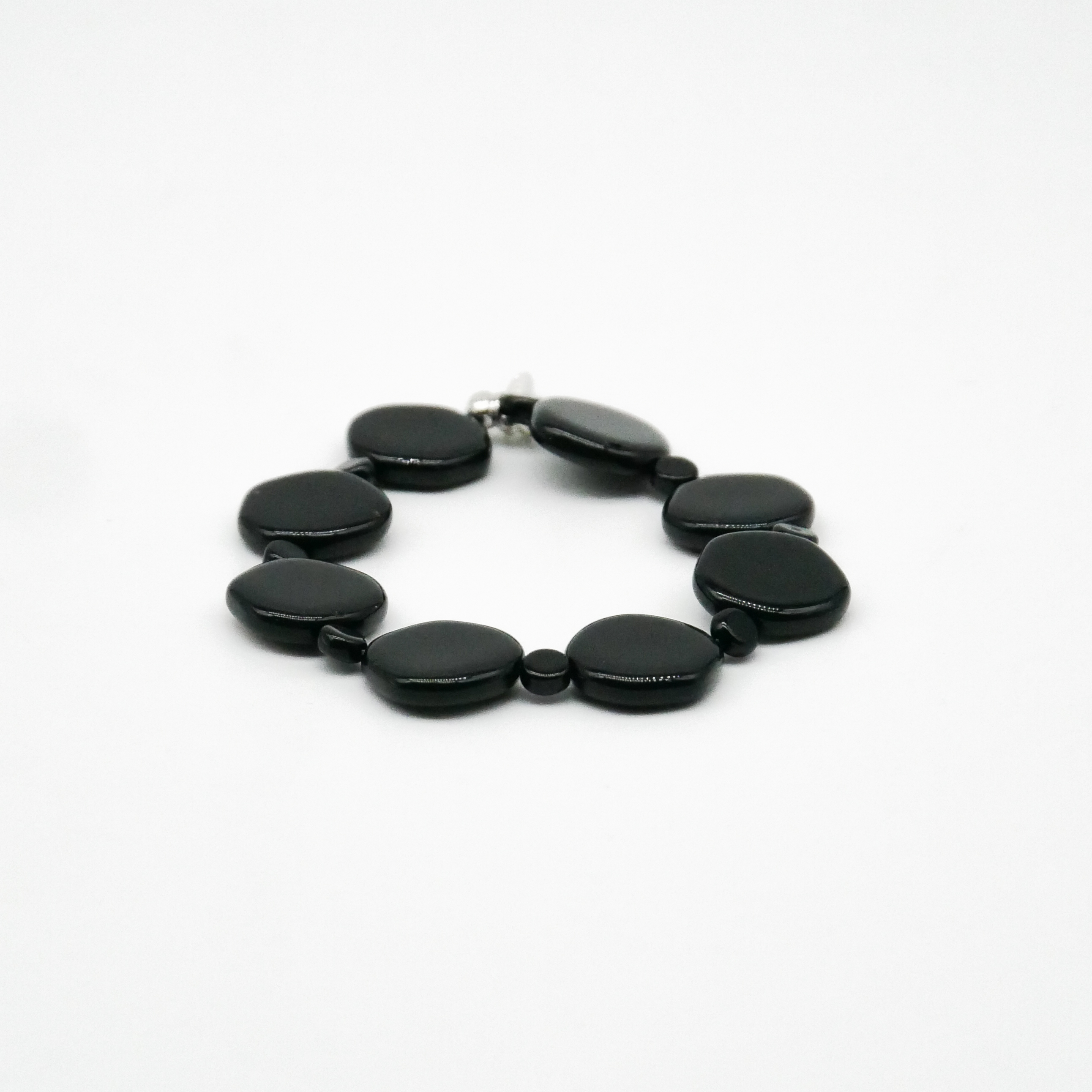  "Jet Schmuck" Armband auf Gummi schwarze Glasperlen, unregelmäßige Scheibe
