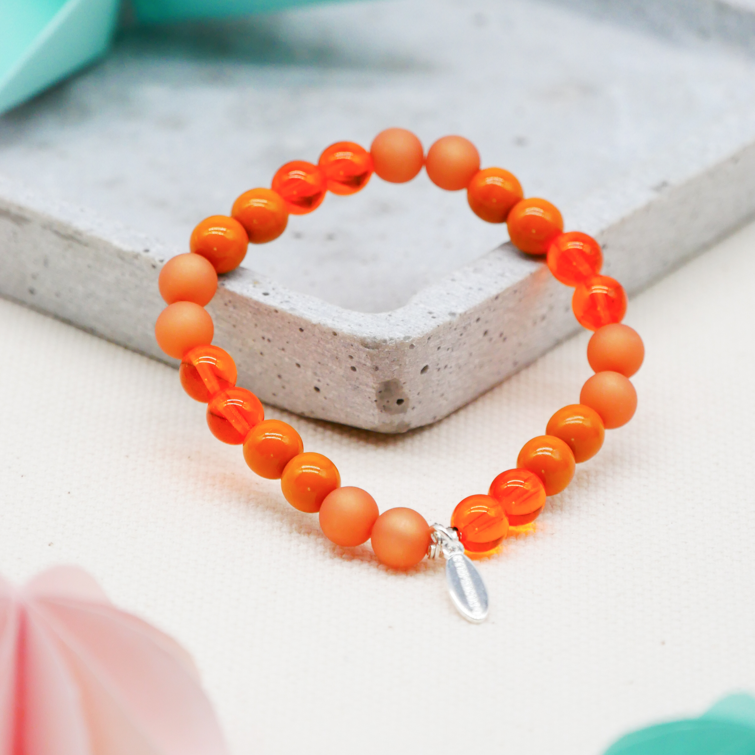  Color Explosion, Armband auf Gummi Ø 8 mm, Glas- und Polaris Perlen, Jupiter orange