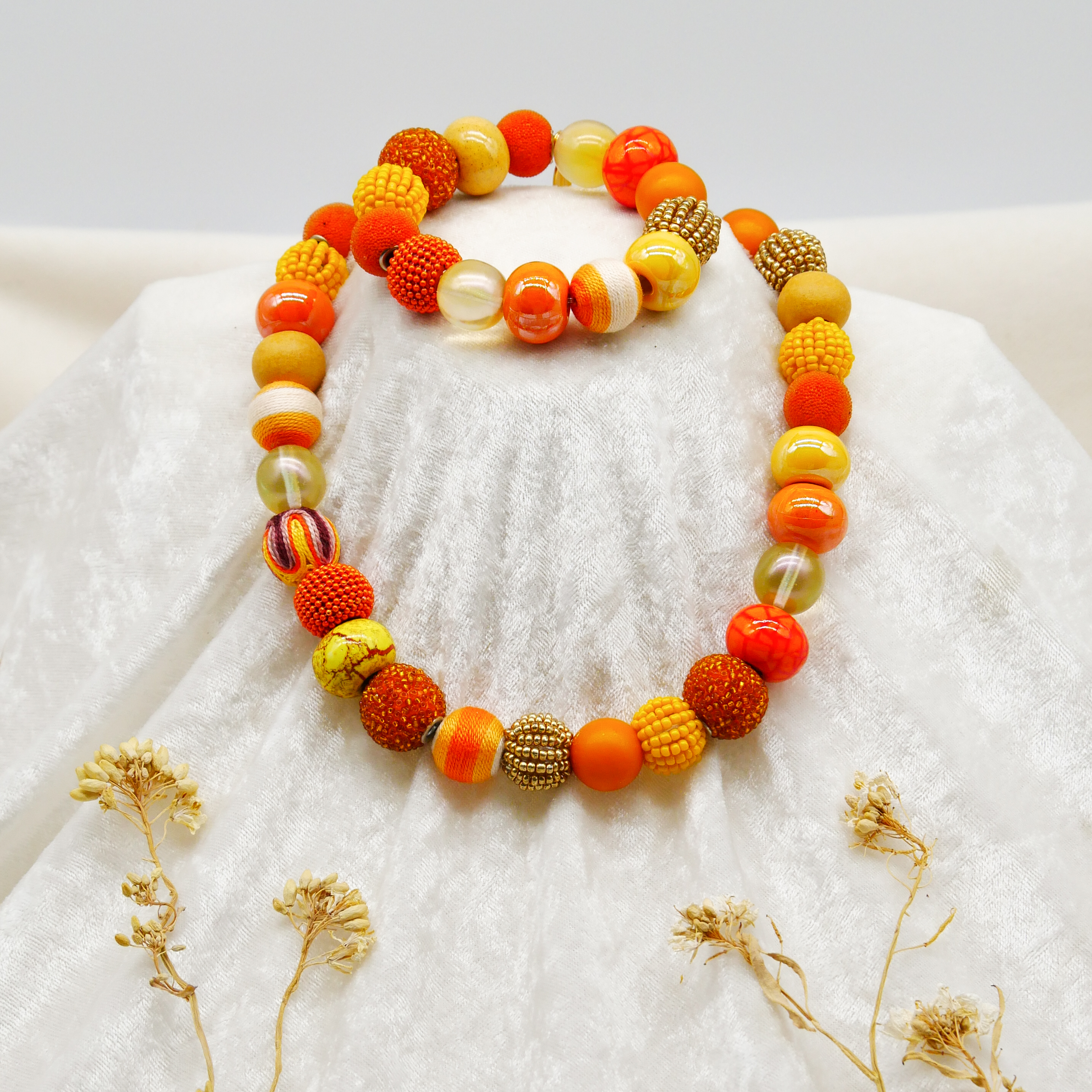  "Bollywood" Armband auf Gummi, gelb-orange