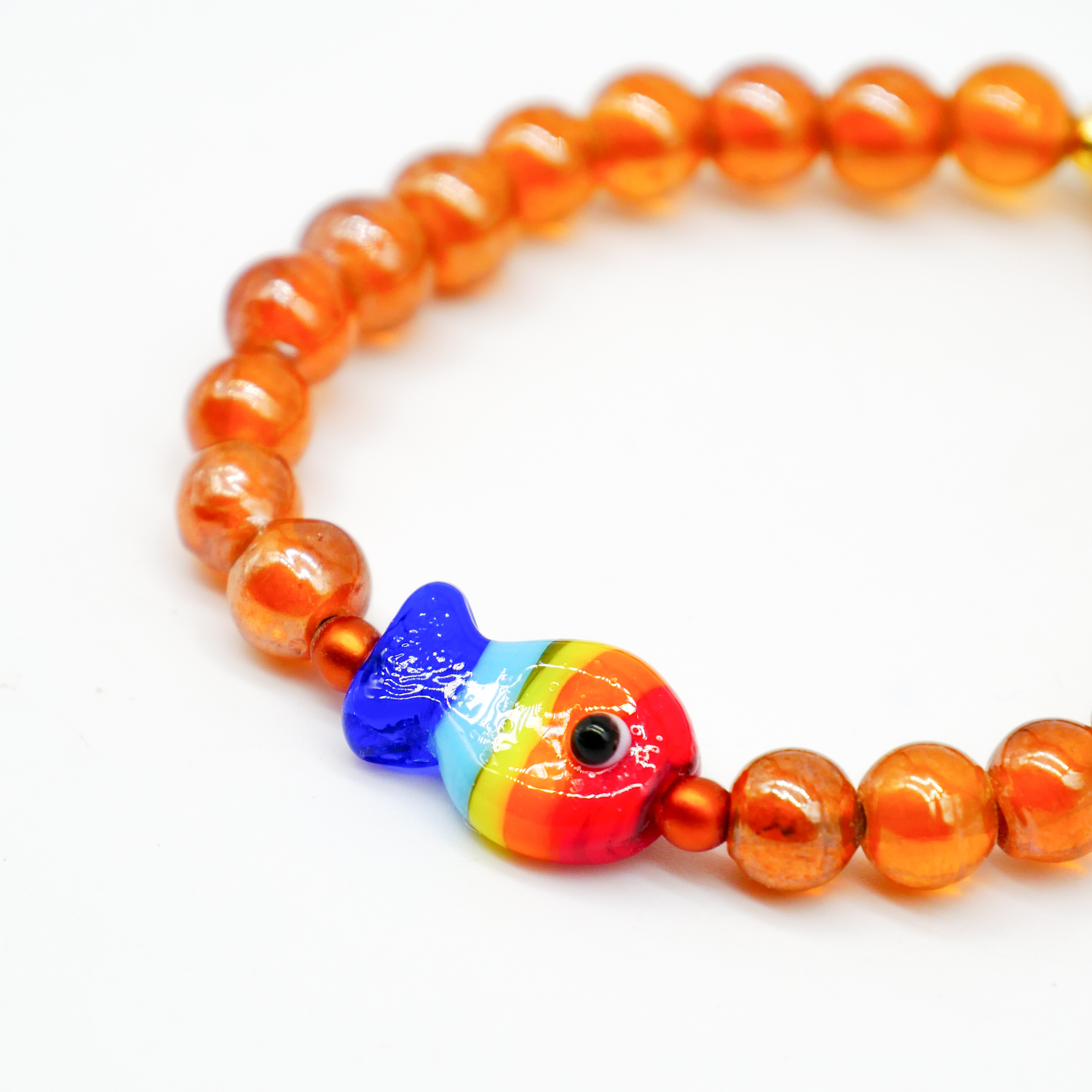 "Summer Feeling" Armband auf Gummi "Fisch" Glasperlen bernstein