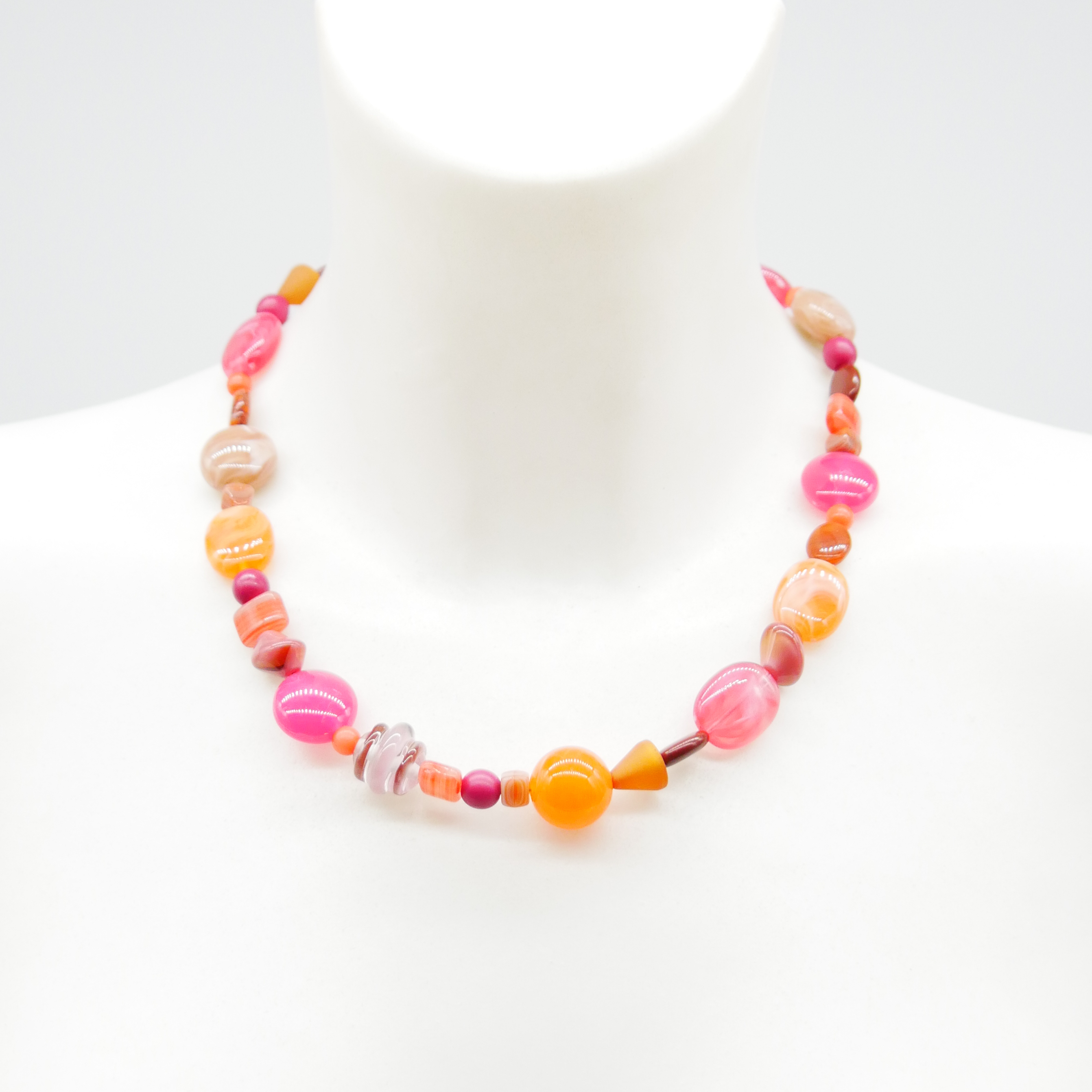 "Summer Feeling",  Chain with different shapes, Glas- and Resin Pearls, pink-orange
