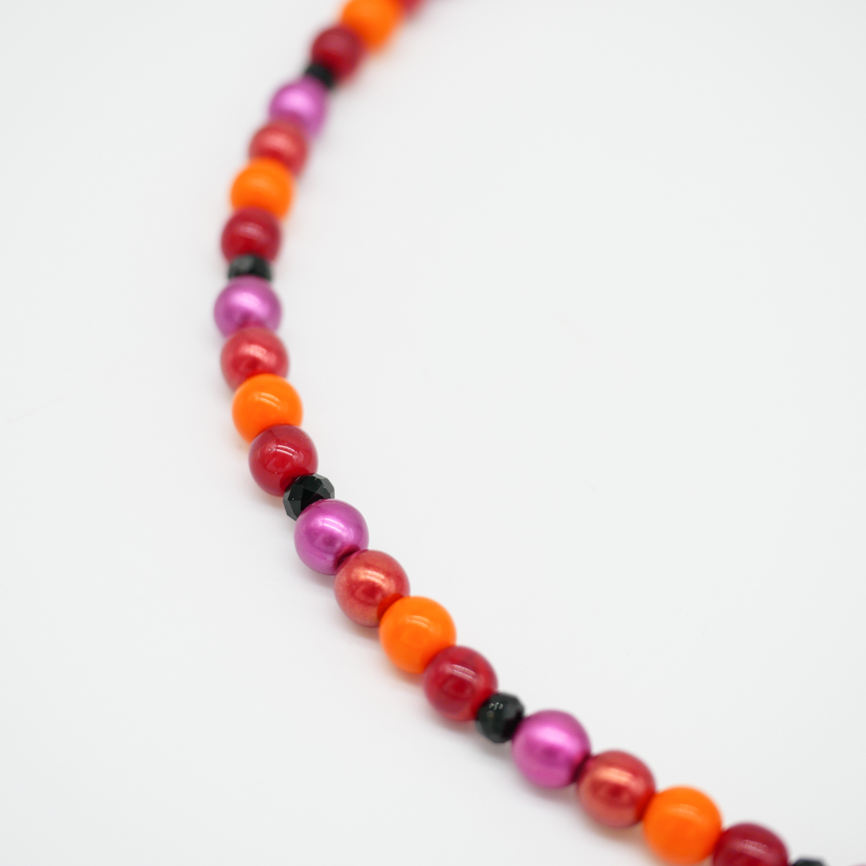 feine kurze Perlenkette, Ruby Sun