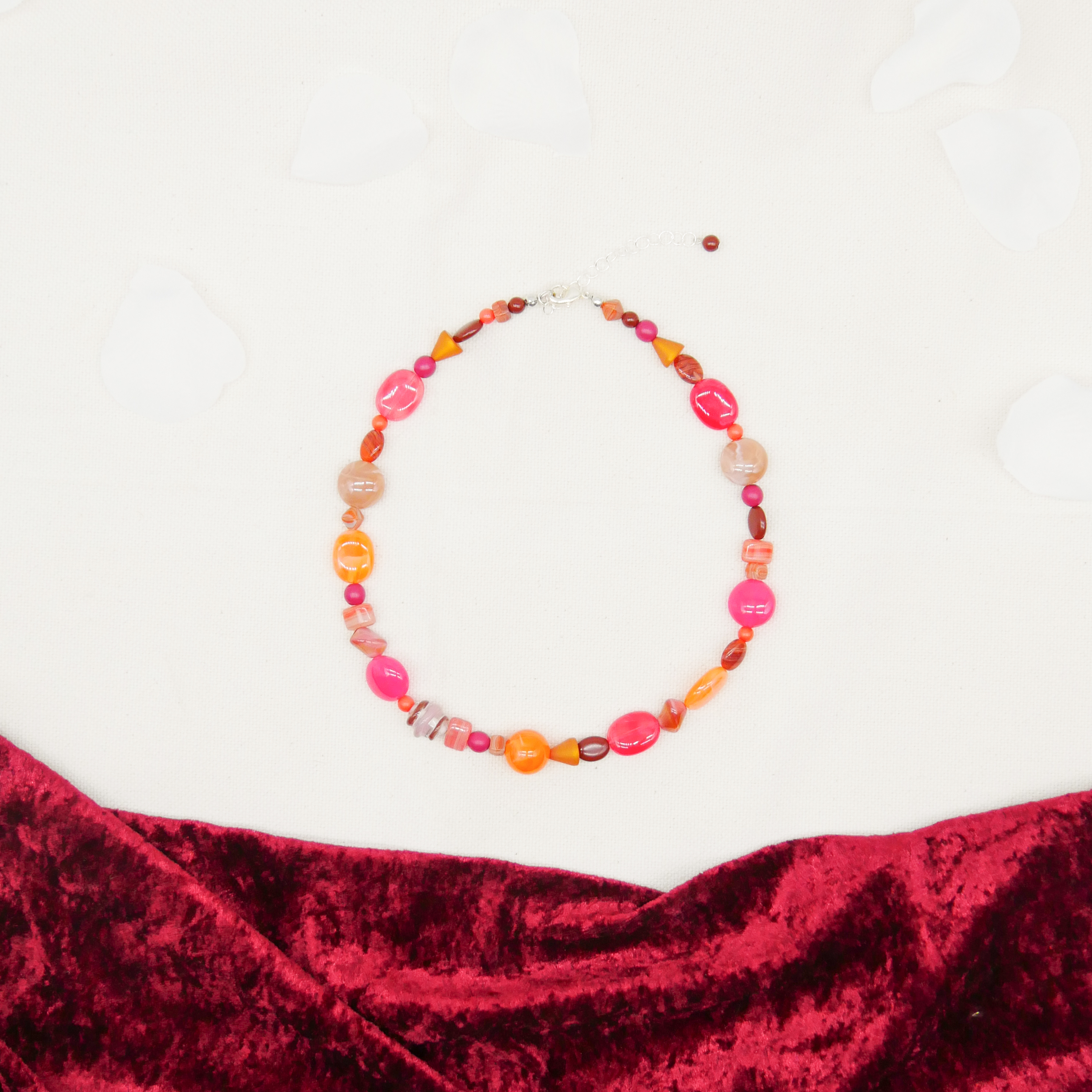 "Summer Feeling",  Chain with different shapes, Glas- and Resin Pearls, pink-orange