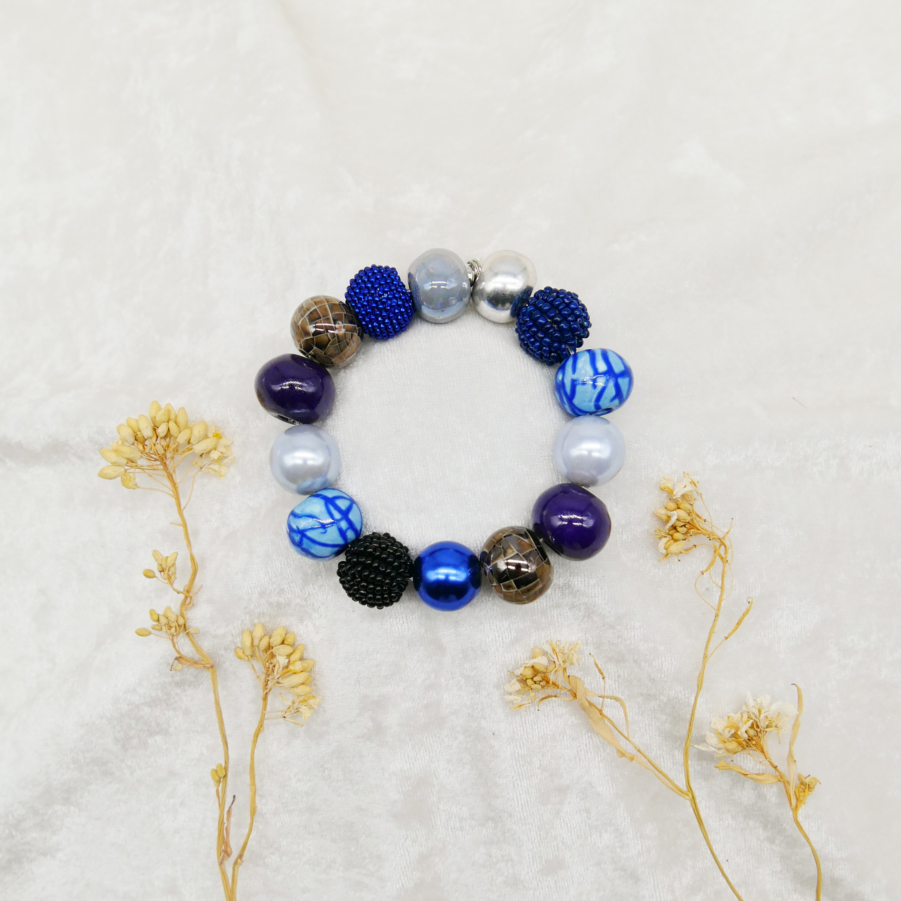  "Bollywood" Armband auf Gummi, blau-silber