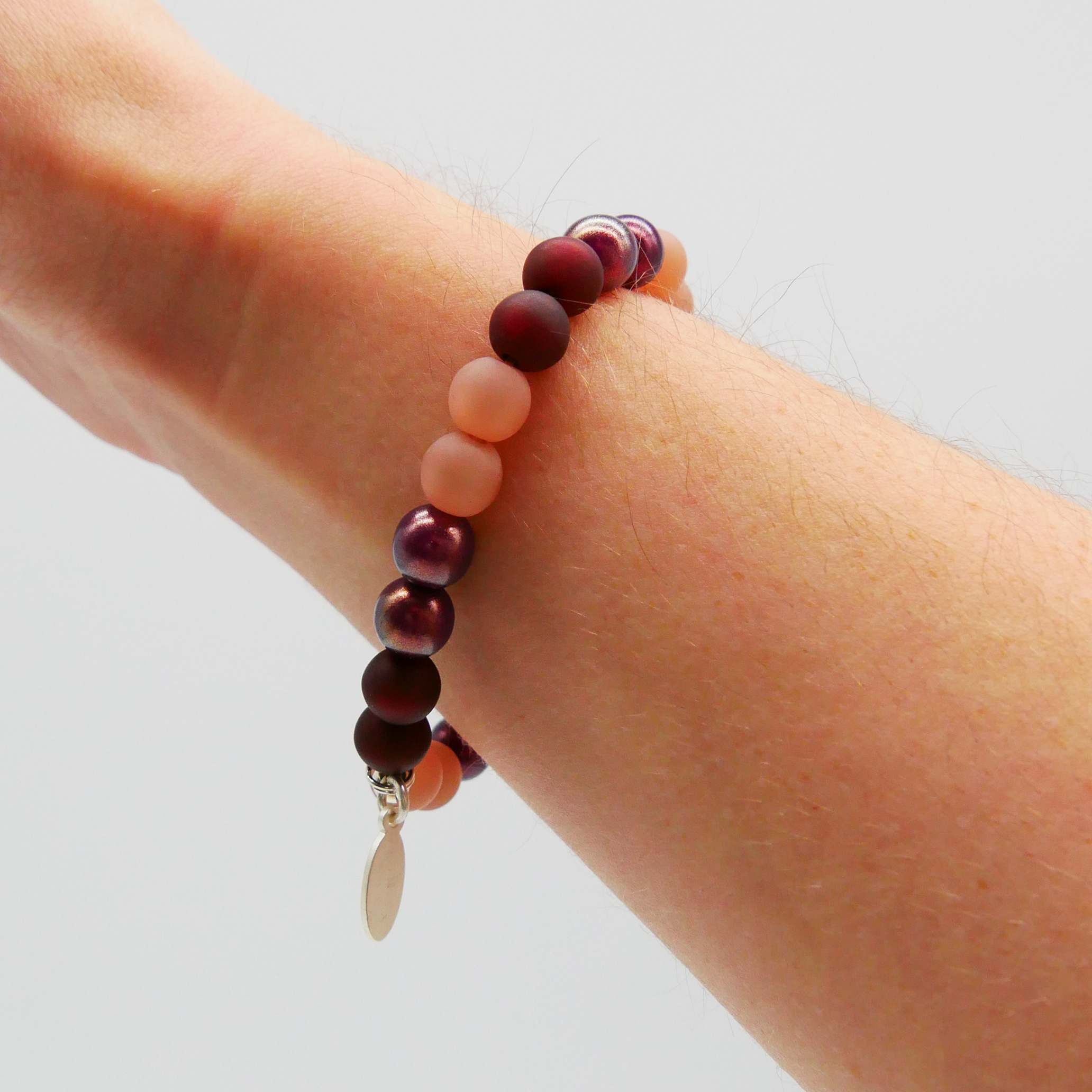  Color Explosion, Armband auf Gummi Ø 8 mm, Glas- und Polaris Perlen, Pluto braun