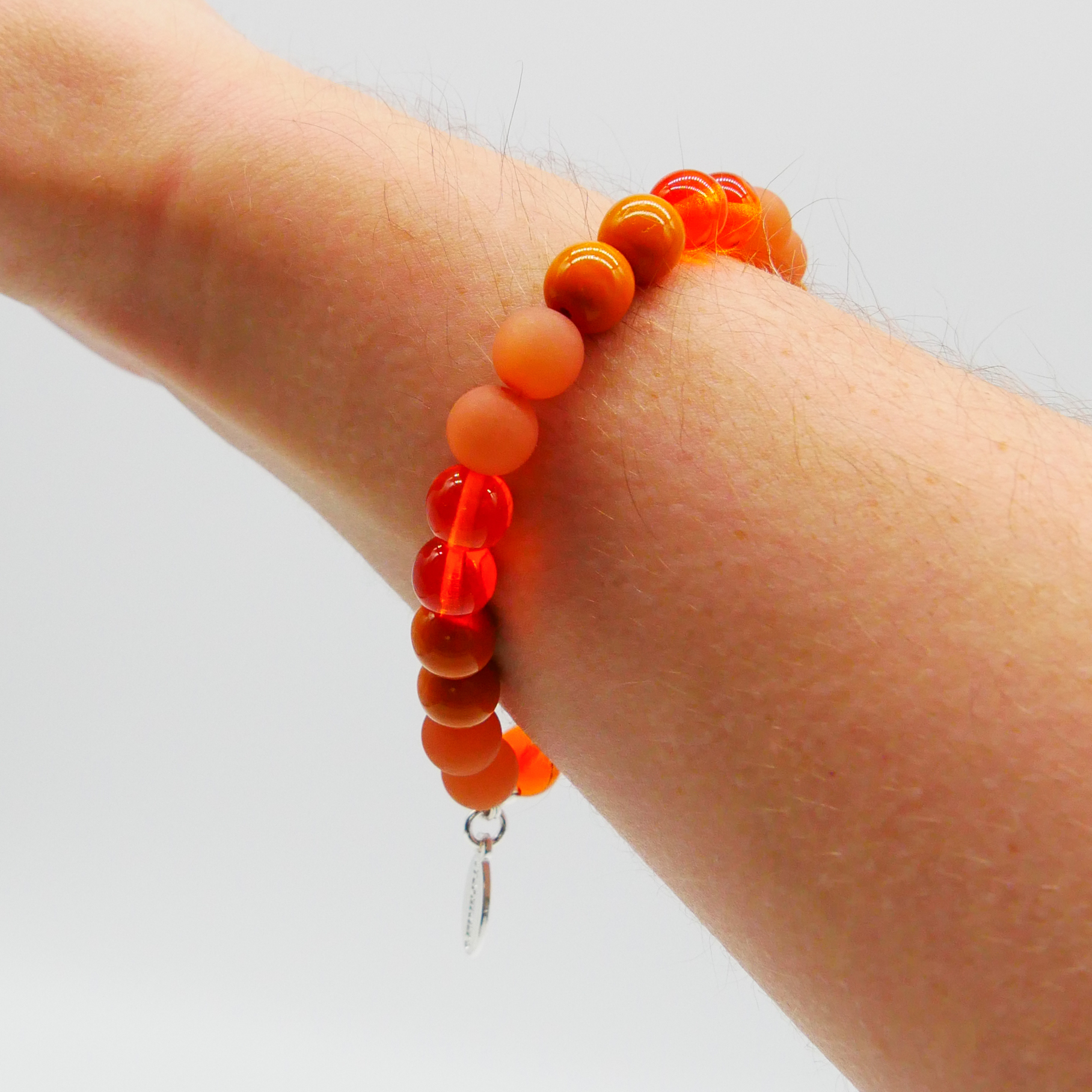  Color Explosion, Armband auf Gummi Ø 8 mm, Glas- und Polaris Perlen, Jupiter orange