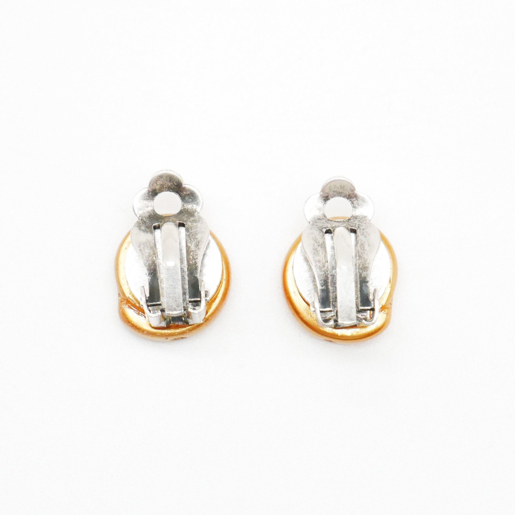  "Shell" Ohrclip kleine Glasschnecke sand