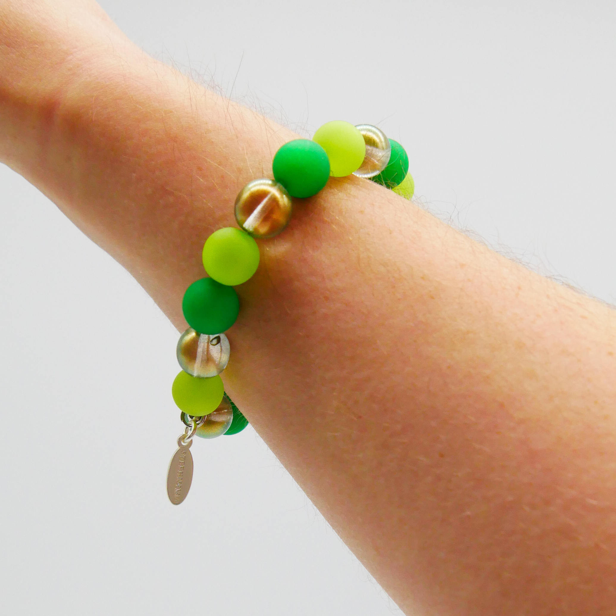  Color Explosion, Armband auf Gummi Ø 8 mm, Glas- und Polaris Perlen, Uranus grün