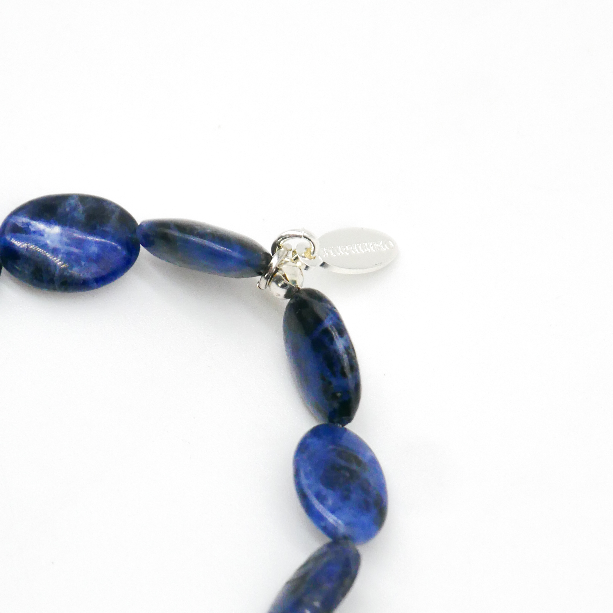  "Crystal Mountain", Armband auf Gummi Sodalit Oliven, 10 x 14 mm