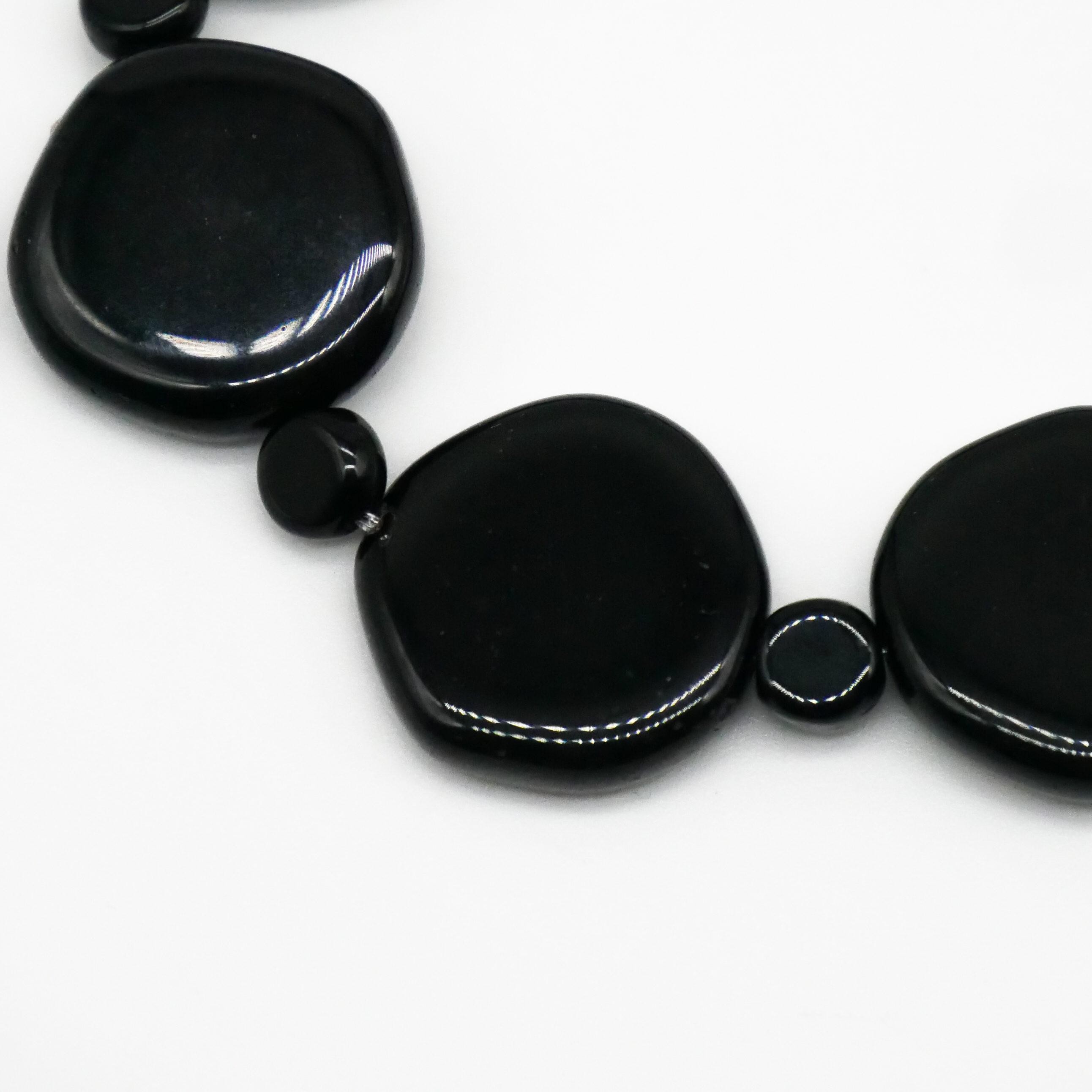  "Jet Schmuck" Armband auf Gummi schwarze Glasperlen, unregelmäßige Scheibe