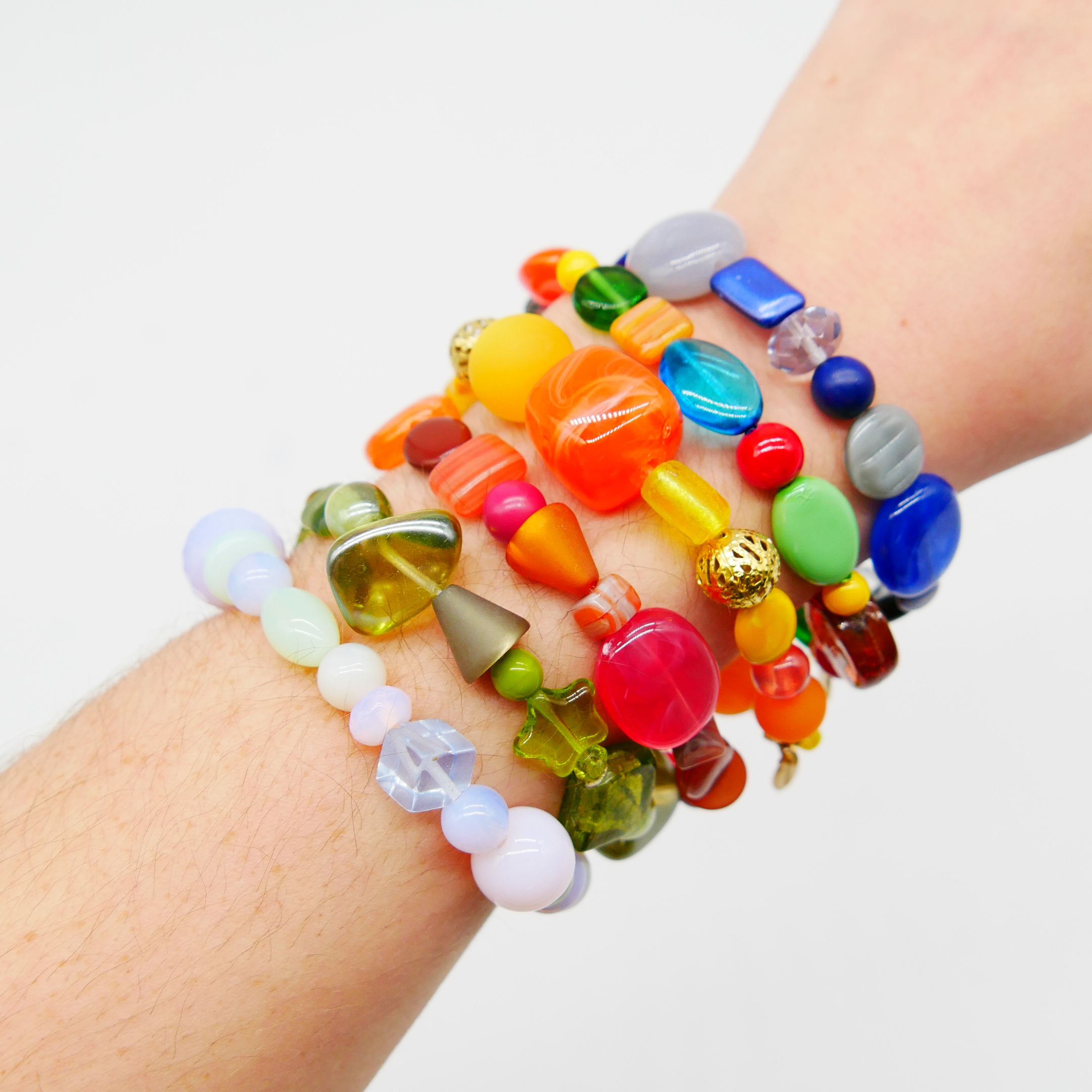 "Summer Feeling", Armband aus verschiedenen Formen, Glas- und Resin Perlen, gelb-orange