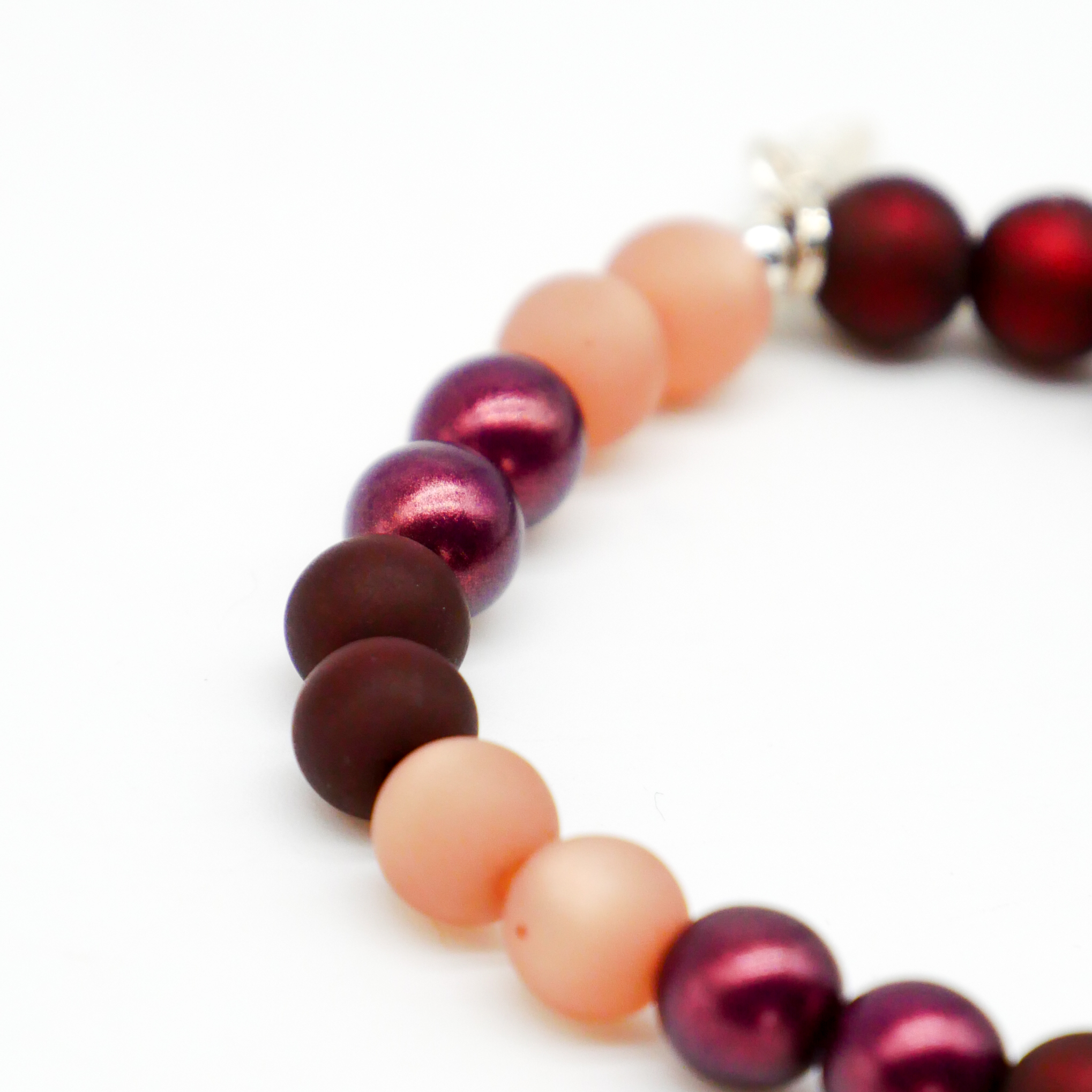  Color Explosion, Armband auf Gummi Ø 8 mm, Glas- und Polaris Perlen, Pluto braun