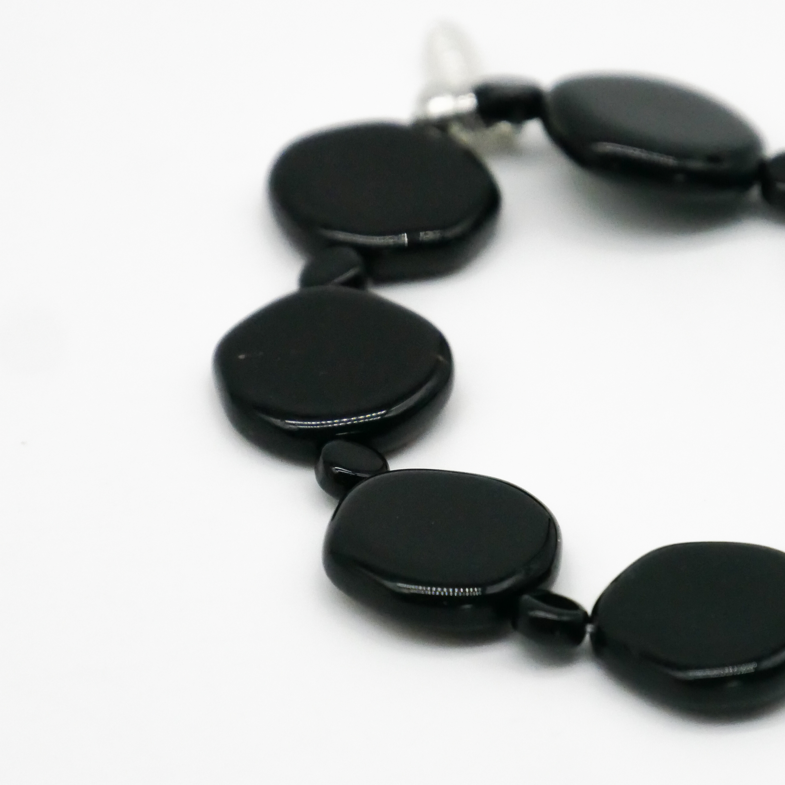  "Jet Schmuck" Armband auf Gummi schwarze Glasperlen, unregelmäßige Scheibe