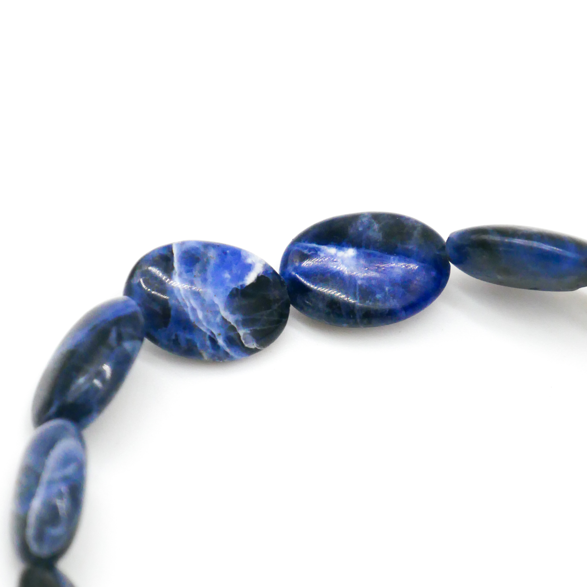 "Crystal Mountain", Armband auf Gummi Sodalit Oliven, 10 x 14 mm