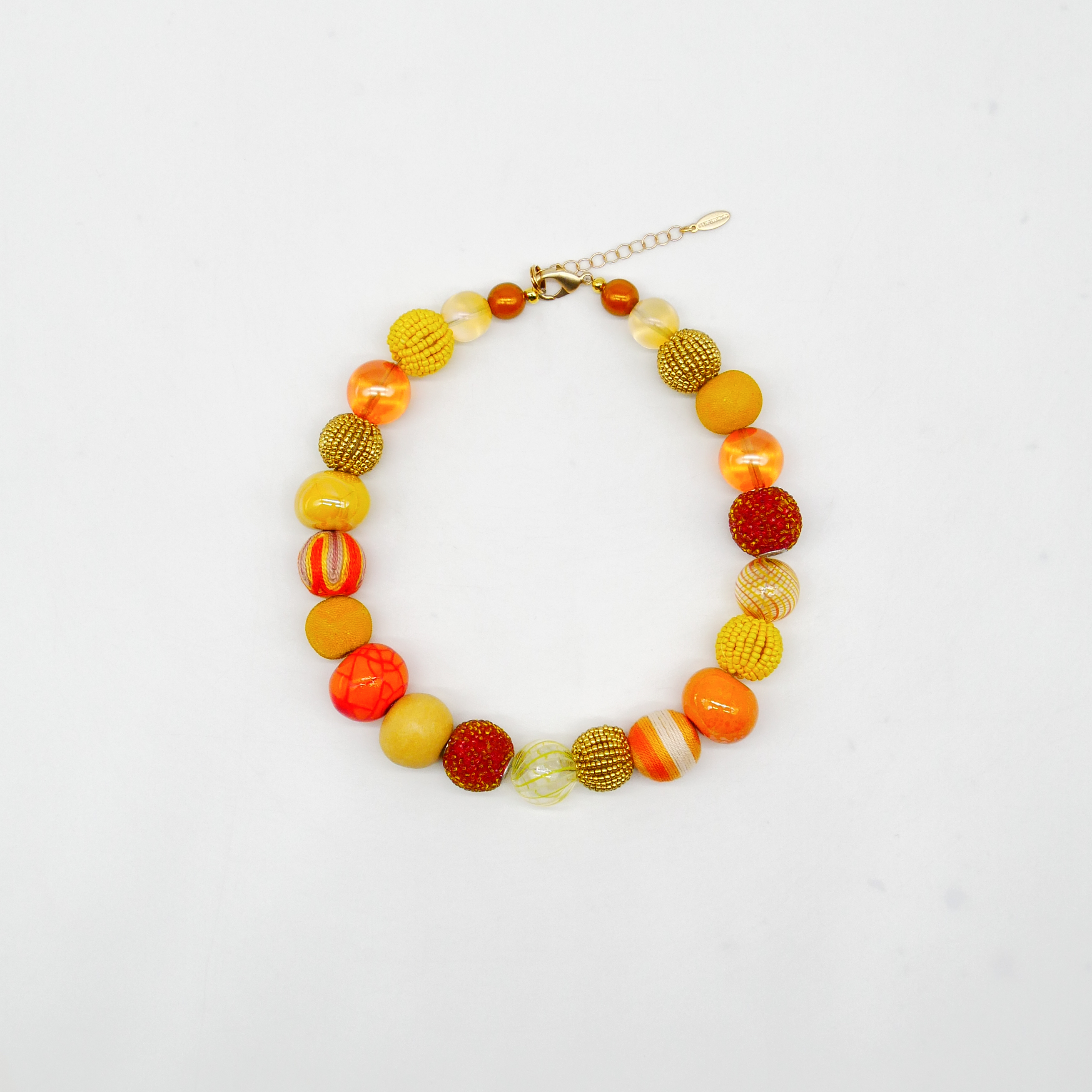 "Bollywood" Kette Ø ca. 20 mm, gelb-orange