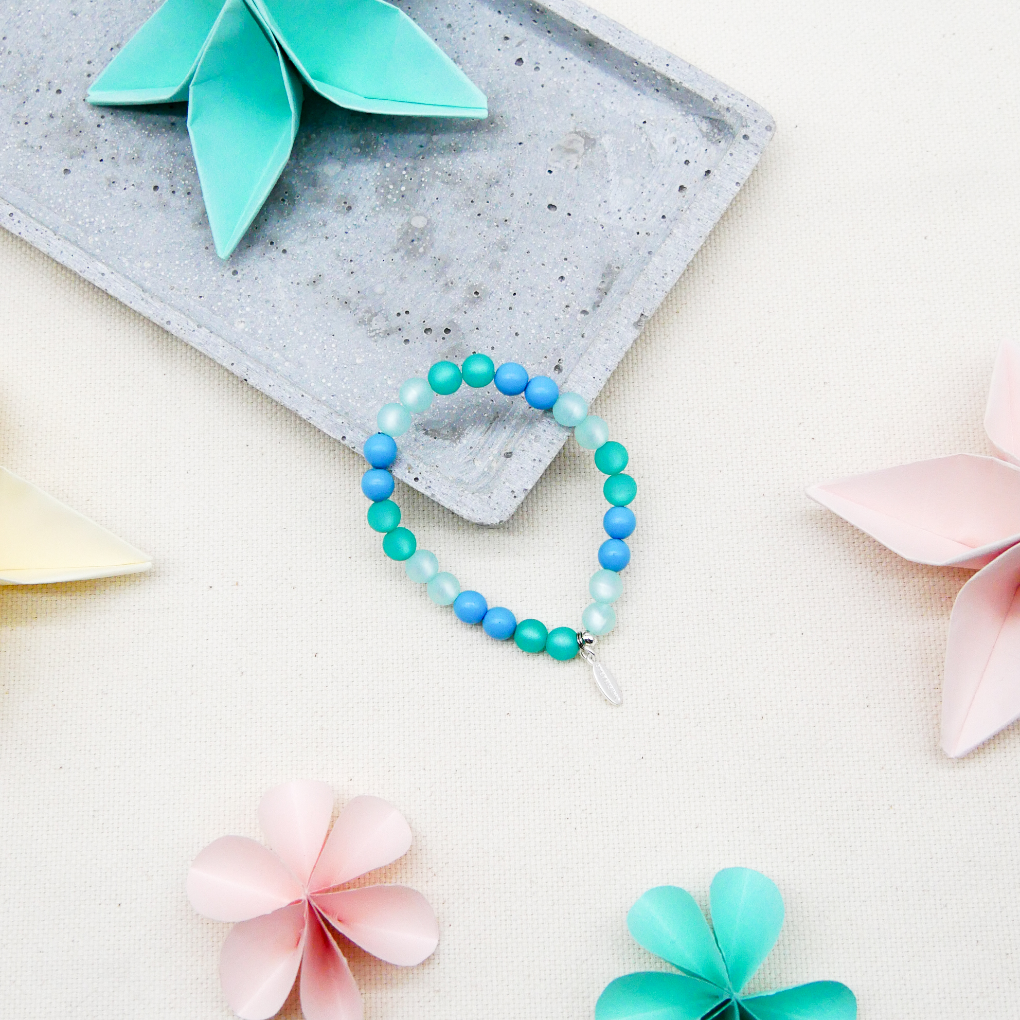  Color Explosion, Armband auf Gummi Ø 8 mm, Glas- und Polaris Perlen, Neptun türkis