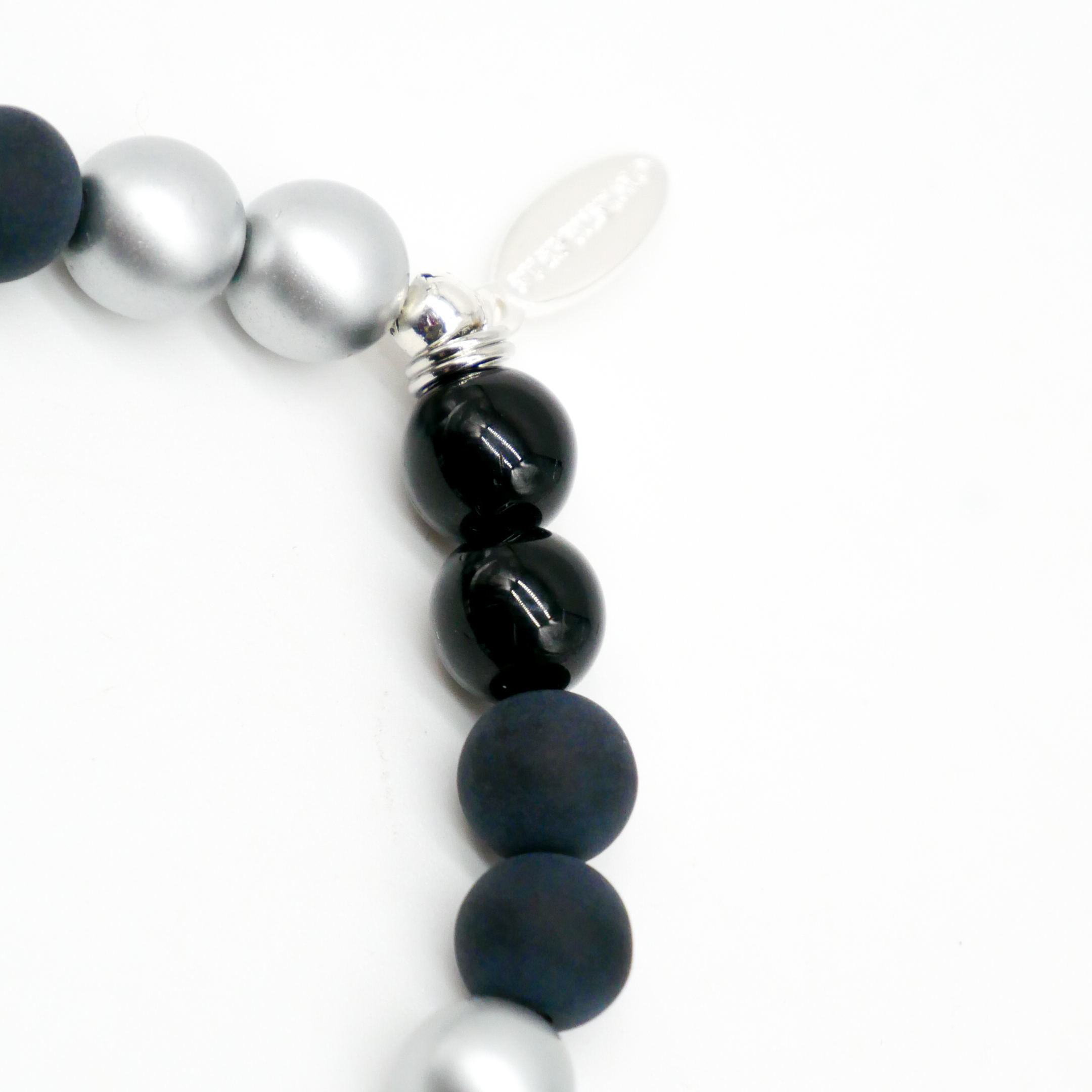  Color Explosion, Armband auf Gummi Ø 8 mm, Glas- und Polaris Perlen, Merkur schwarz-silber