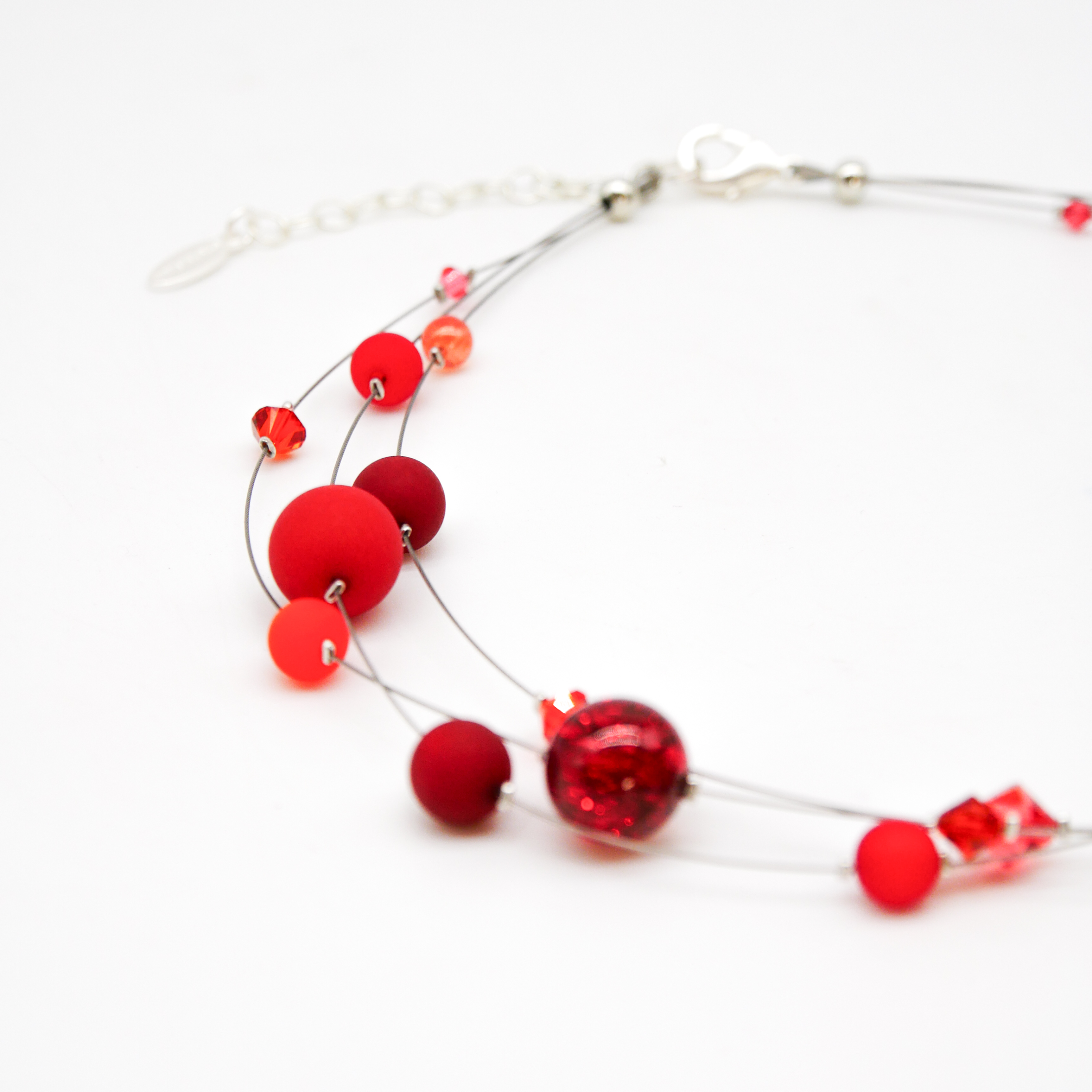 “Color Explosion”, short 3 strand necklace with polaris beads - sunset red “Color Explosion”, short 3 strand necklace with polaris beads - sunset red