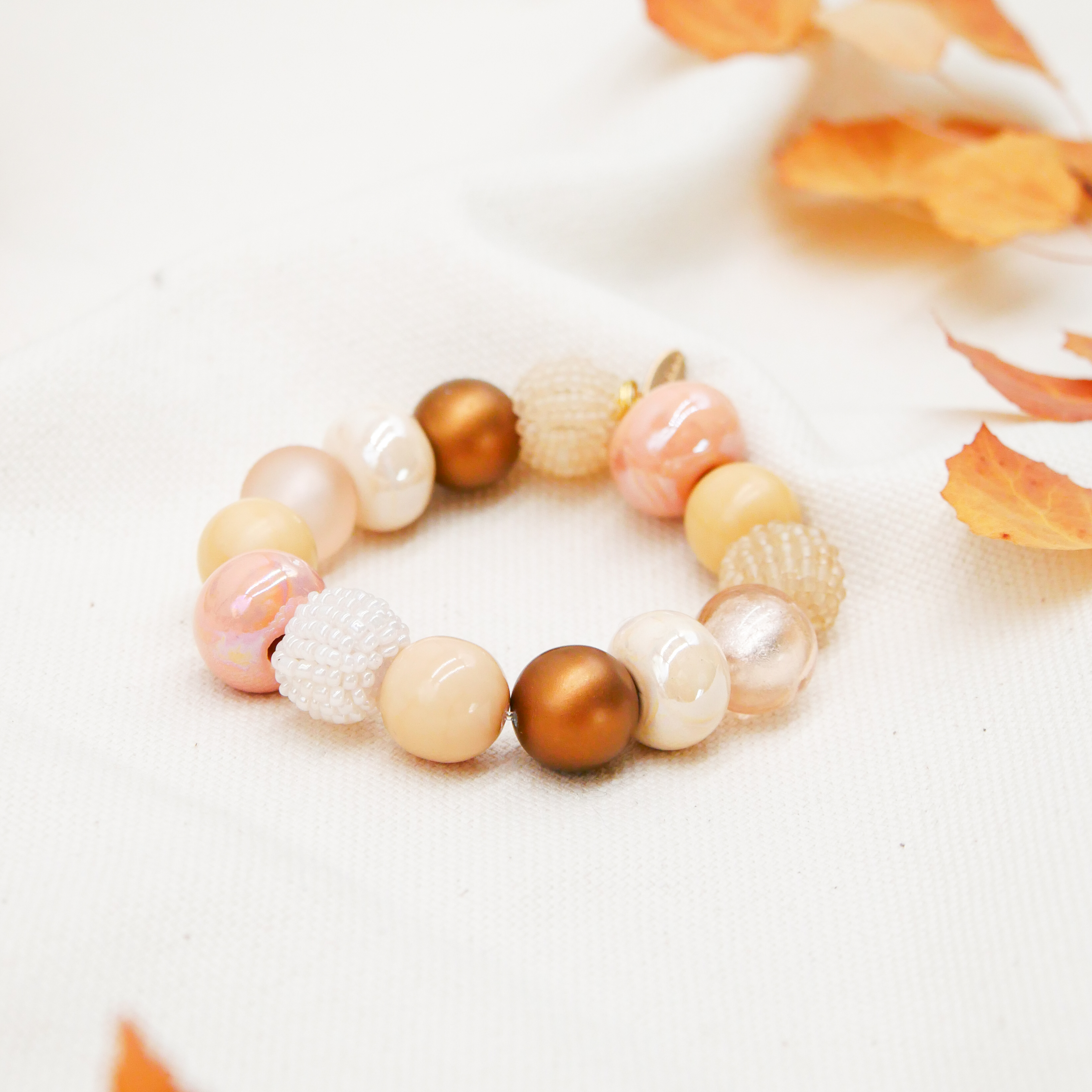 Armband auf Gummi zu "Bollywood", Champagnerglanz Armband auf Gummi zu "Bollywood", Champagnerglanz