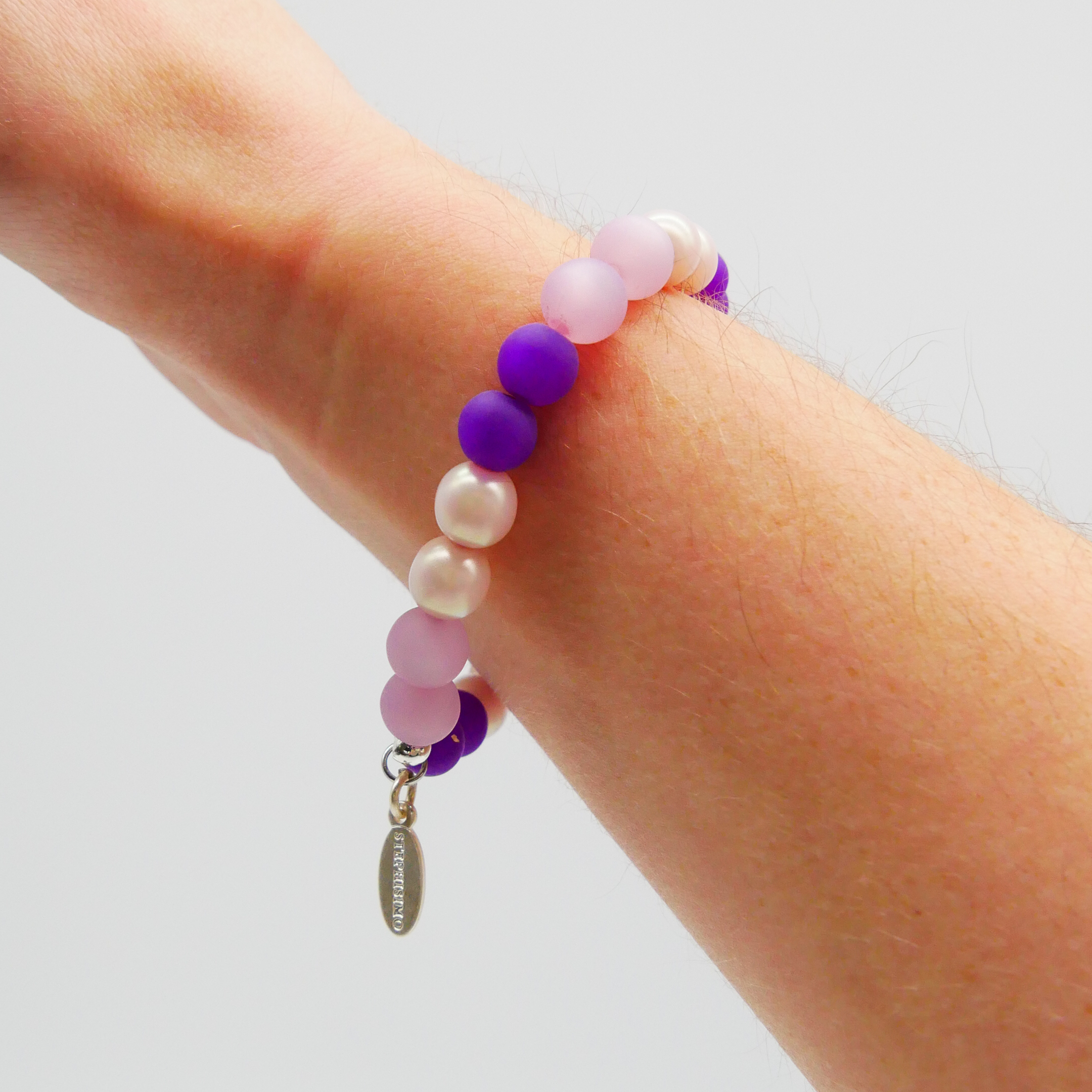  Color Explosion, Armband auf Gummi Ø 8 mm, Glas- und Polaris Perlen, Saturn lila