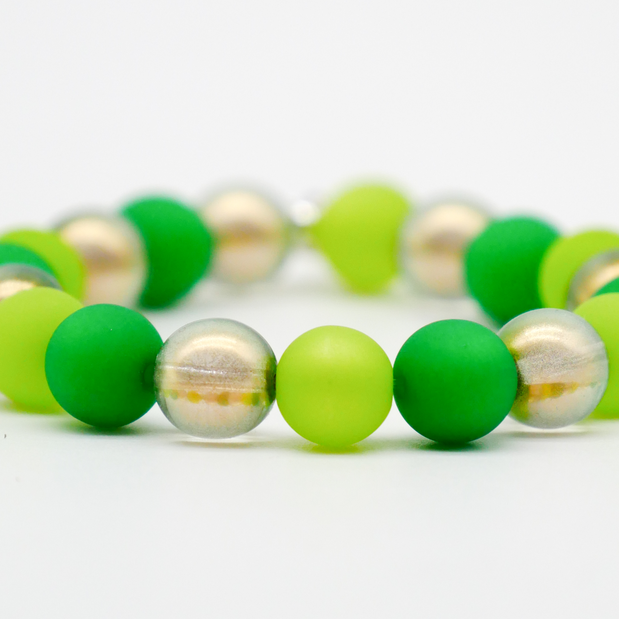  Color Explosion, Armband auf Gummi Ø 8 mm, Glas- und Polaris Perlen, Uranus grün