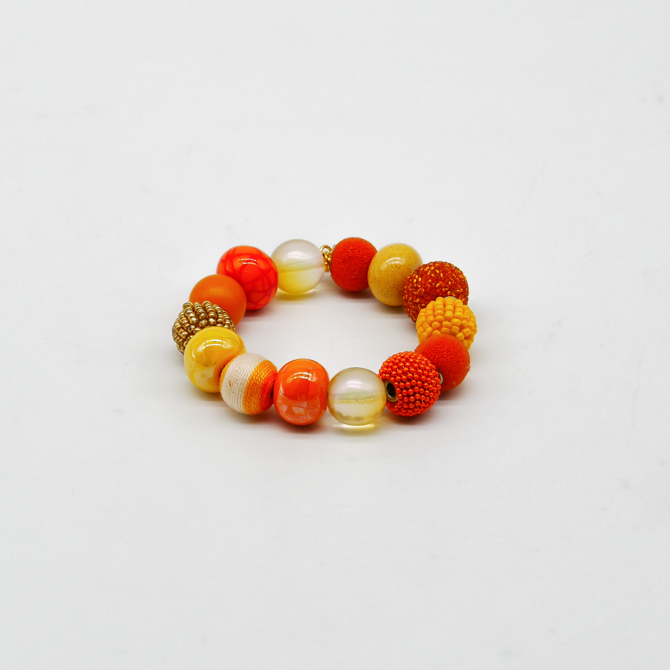  "Bollywood" Armband auf Gummi, gelb-orange