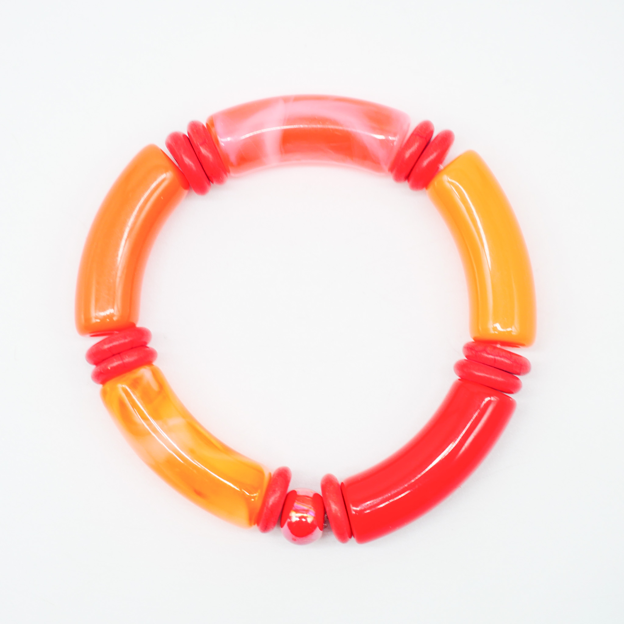 Bracelet "tube" on elastic string, curved plastic pearls + howite, orange
