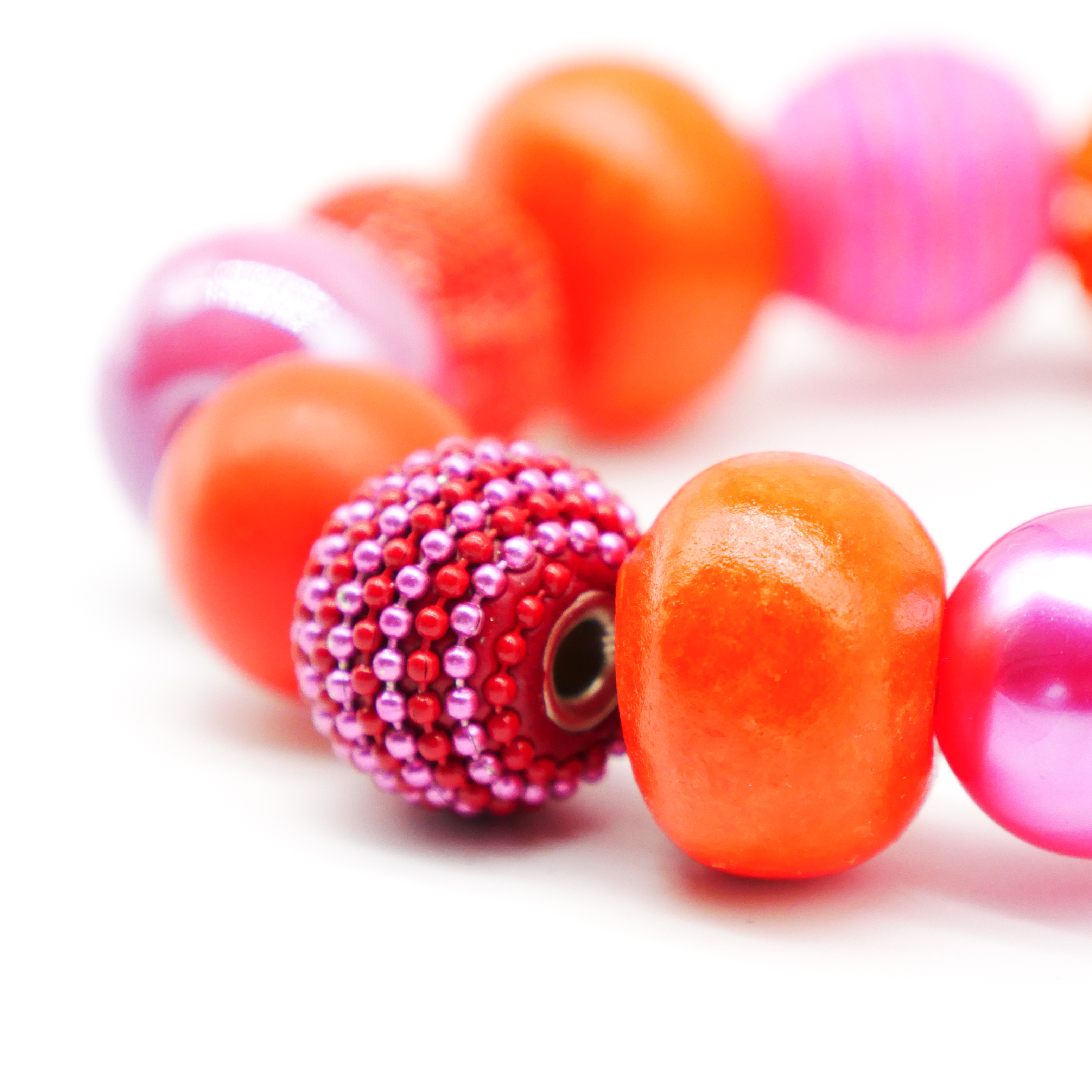  "Bollywood" Armband auf Gummi, pink-orange