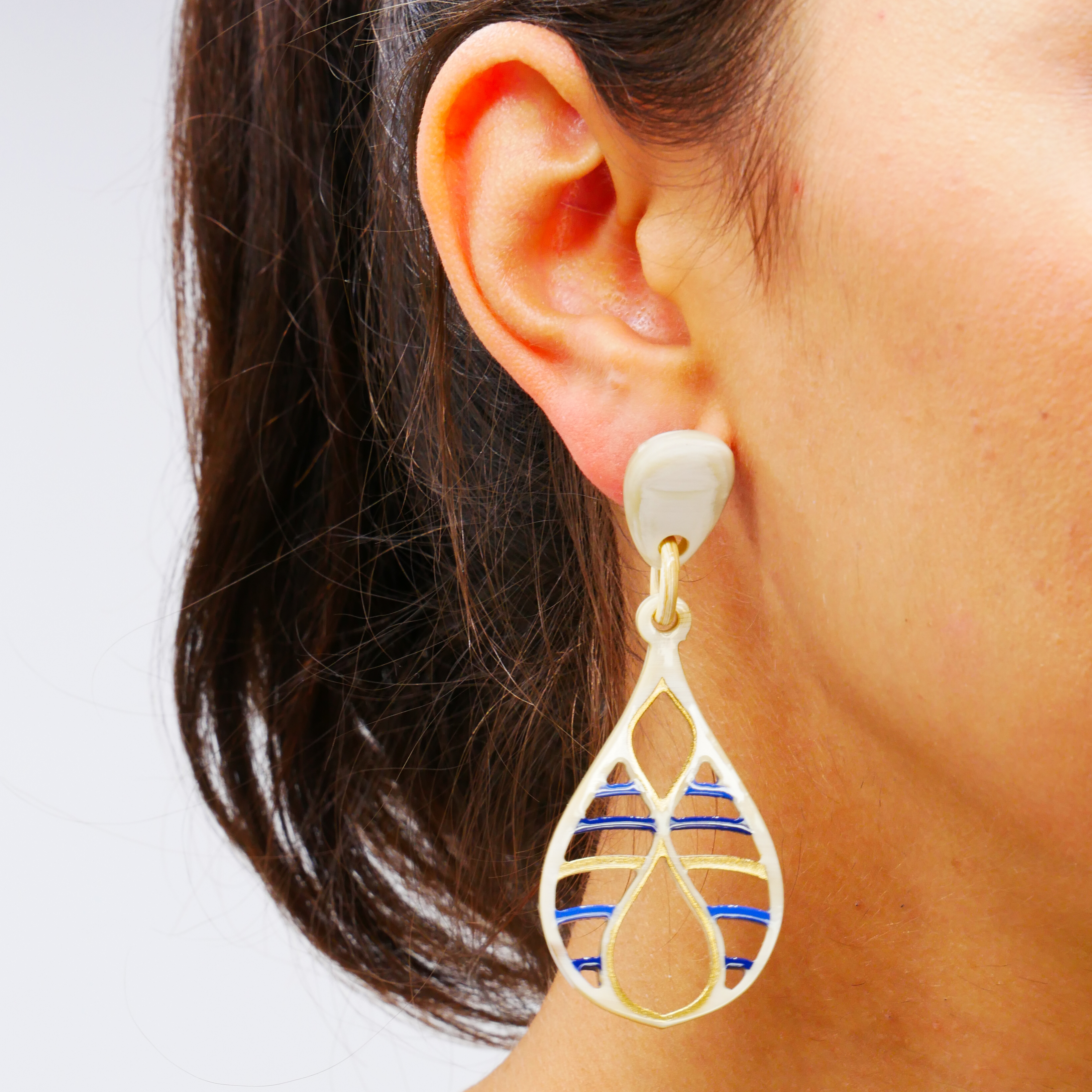 “Craft Art”, “Teardrop” earring, white horn, blue-golden lacquer “Craft Art”, “Teardrop” earring, white horn, blue-golden lacquer