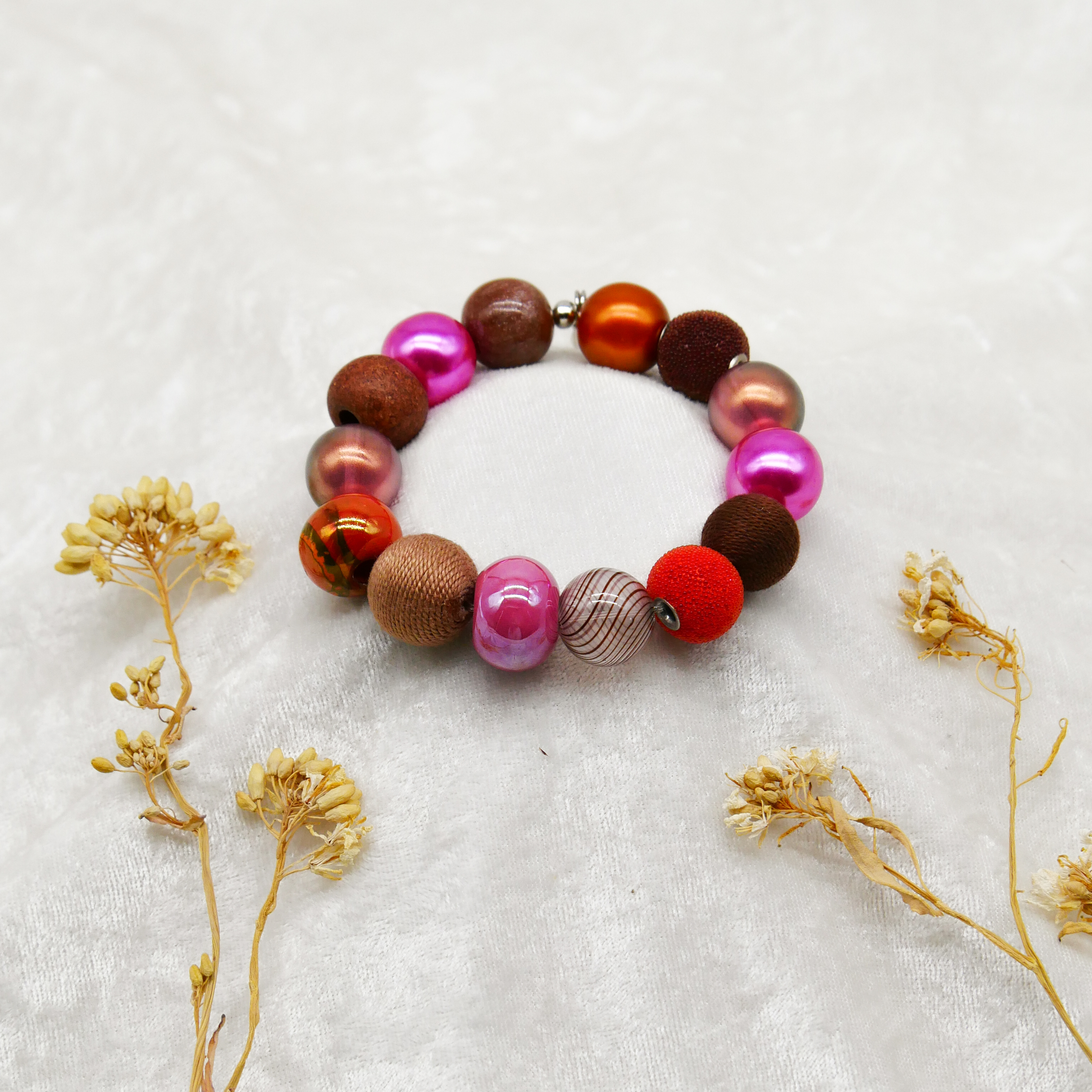  "Bollywood" Armband auf Gummi, braun-pink