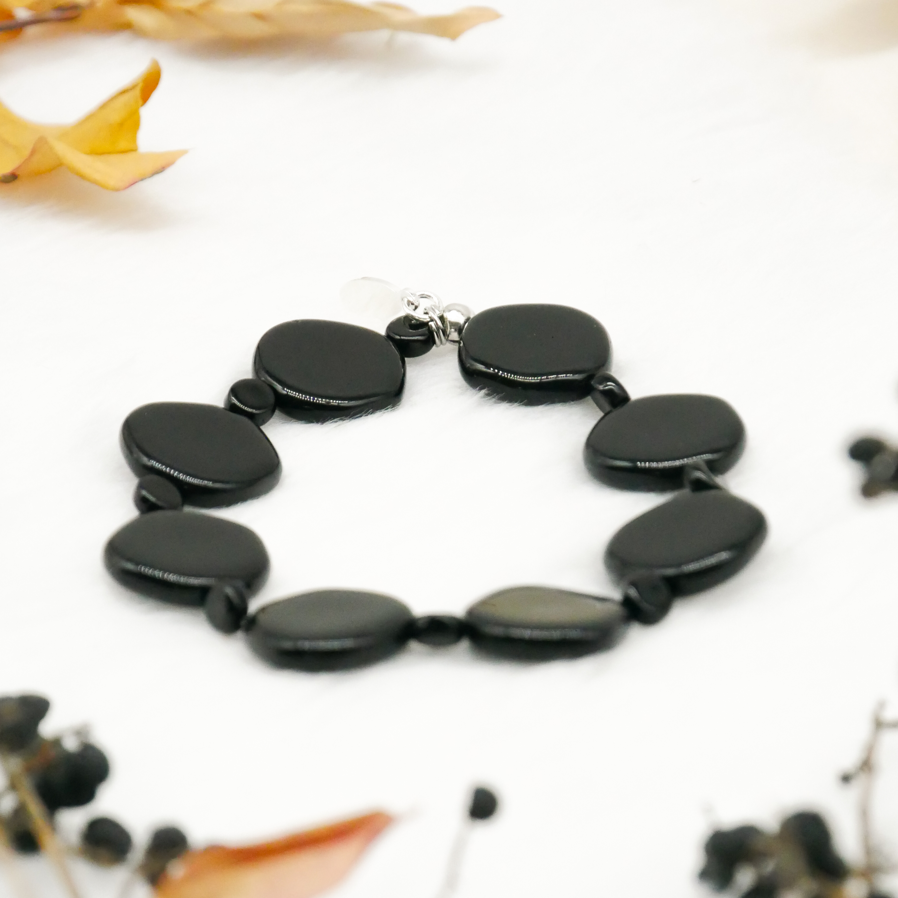  "Jet Schmuck" Armband auf Gummi schwarze Glasperlen, unregelmäßige Scheibe