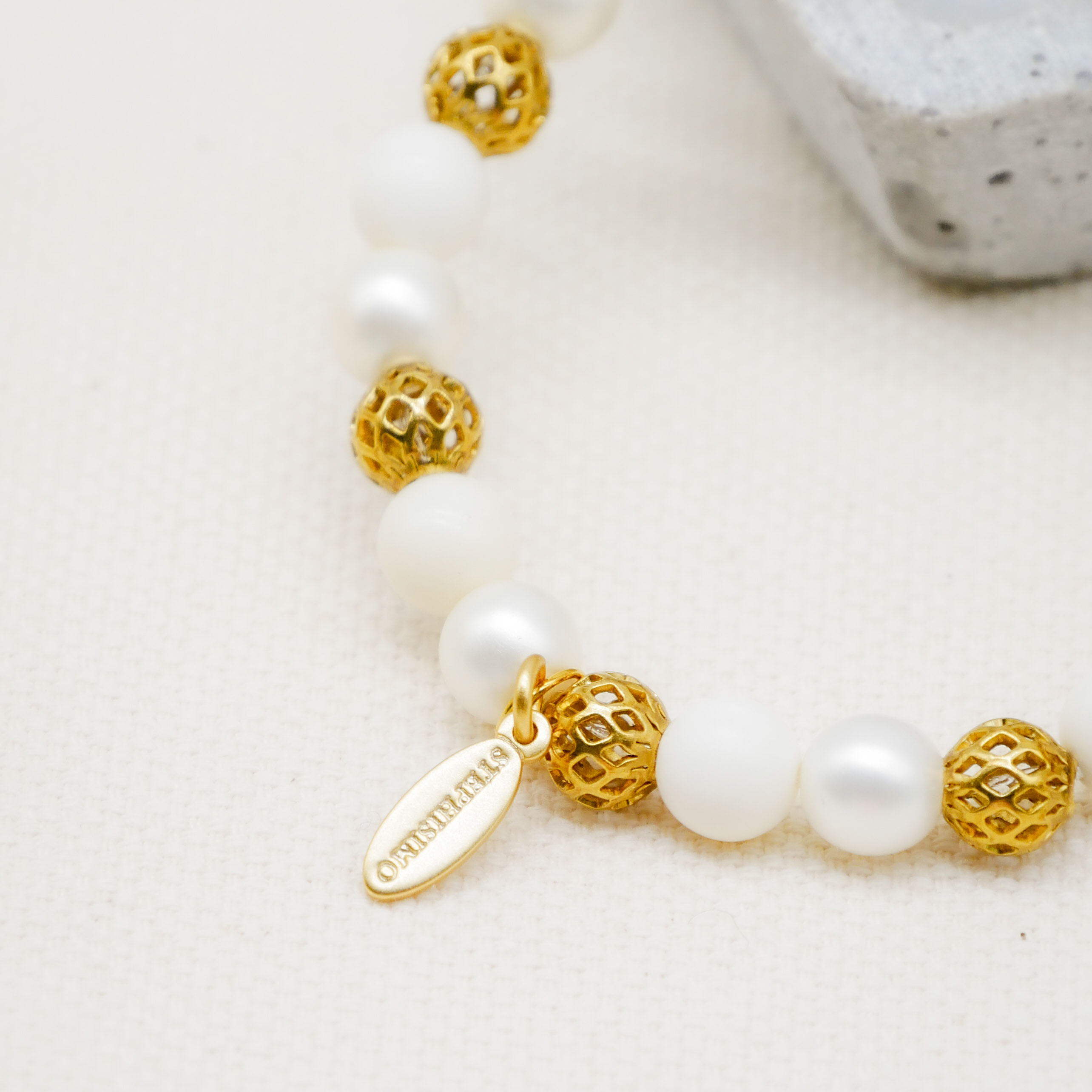  Color Explosion, Armband auf Gummi Ø 8 mm, Glas- und Polaris Perlen, Venus weiß-gold