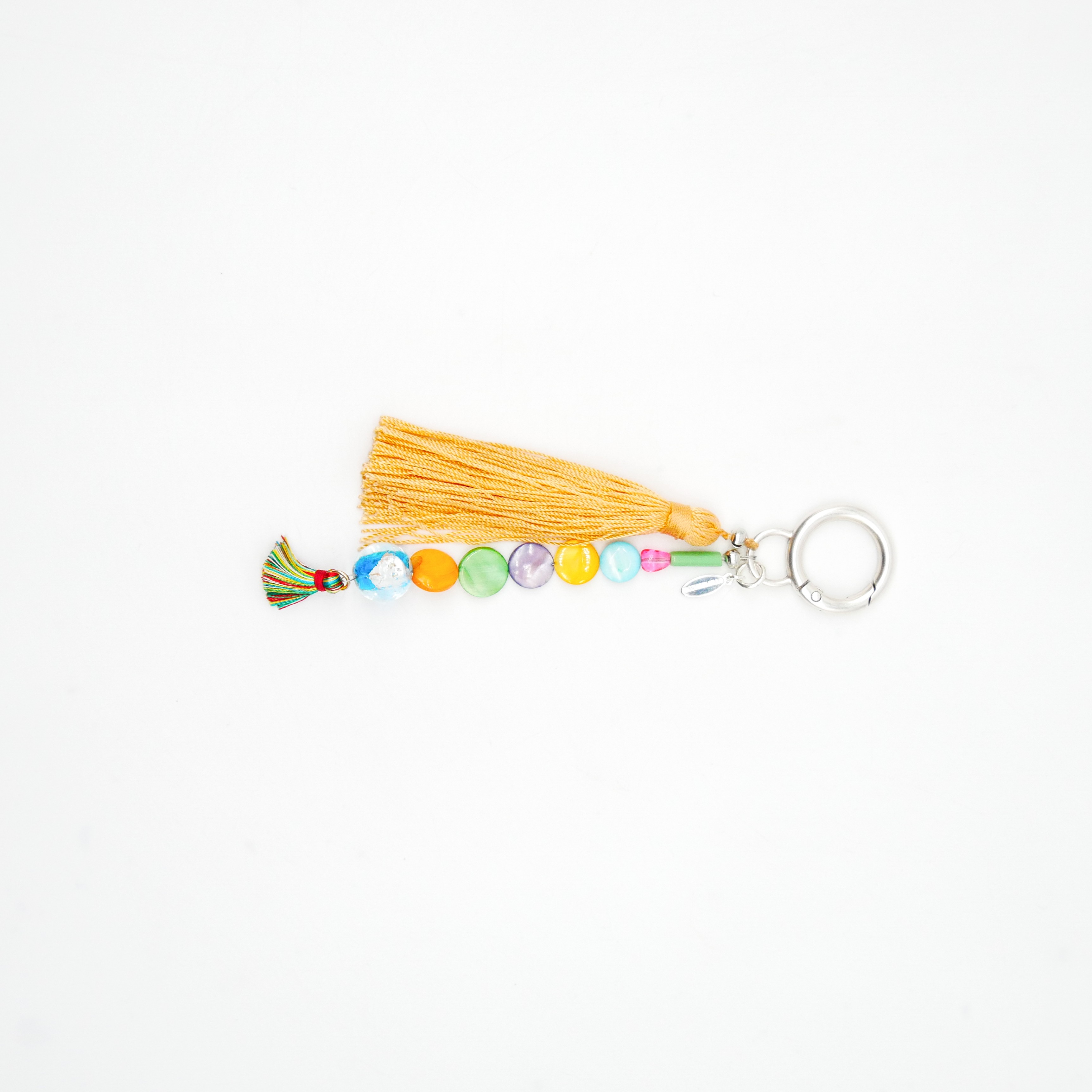 "Lucky Pendant" Anhänger, 1 Strang bunte Muschelperlen, Glasperle und große Quaste 