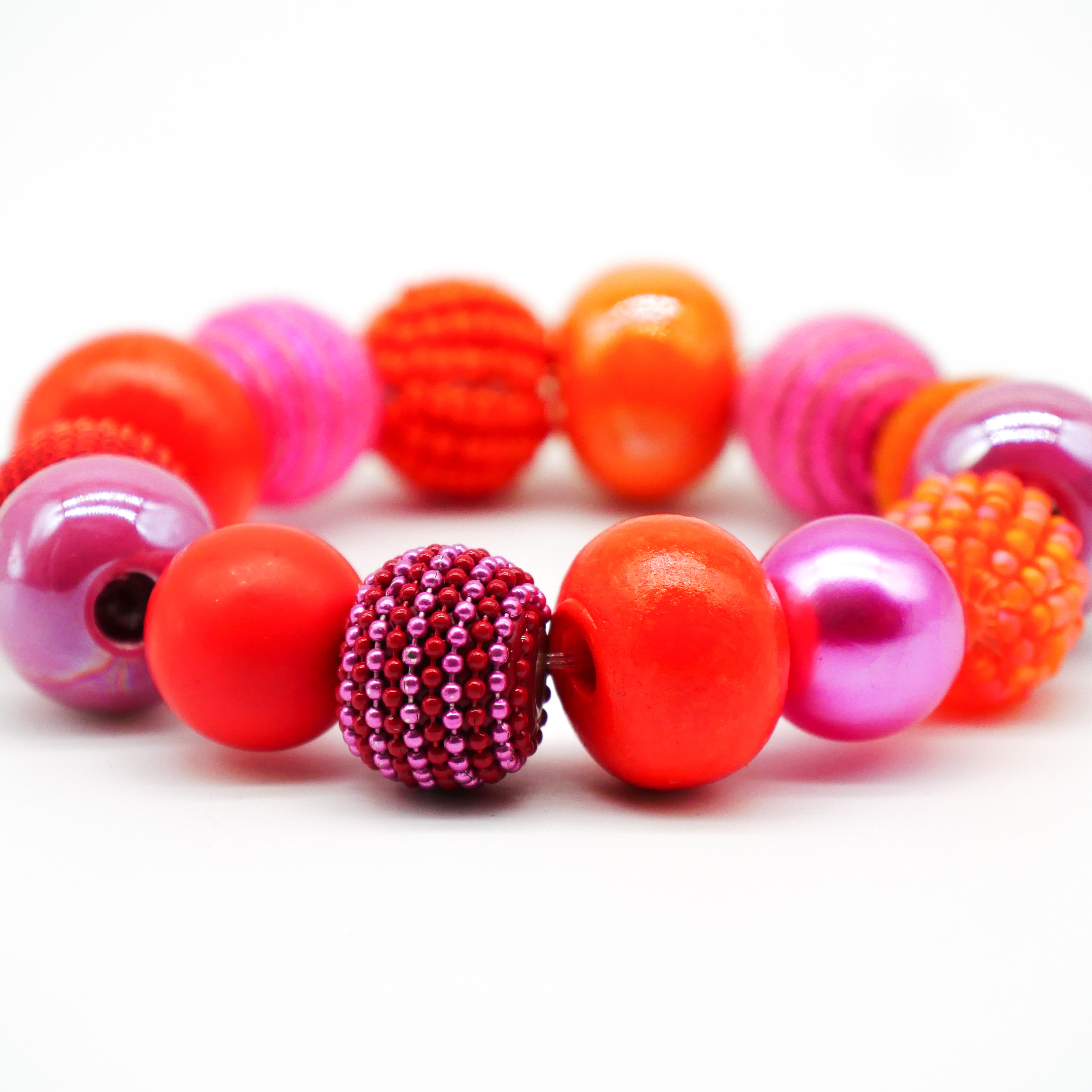  "Bollywood" Armband auf Gummi, pink-orange
