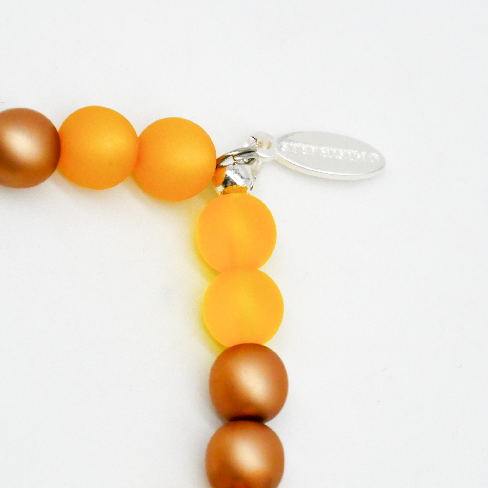  Color Explosion, Armband auf Gummi Ø 8 mm, Glas- und Polaris Perlen, Sonne gold-gelb