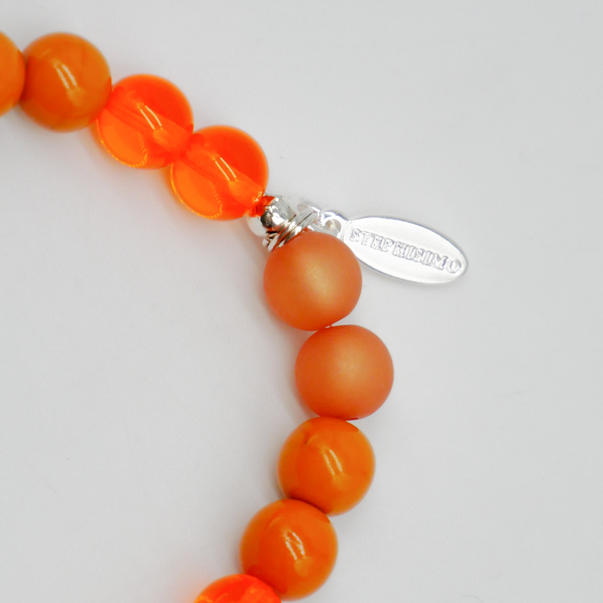  Color Explosion, Armband auf Gummi Ø 8 mm, Glas- und Polaris Perlen, Jupiter orange