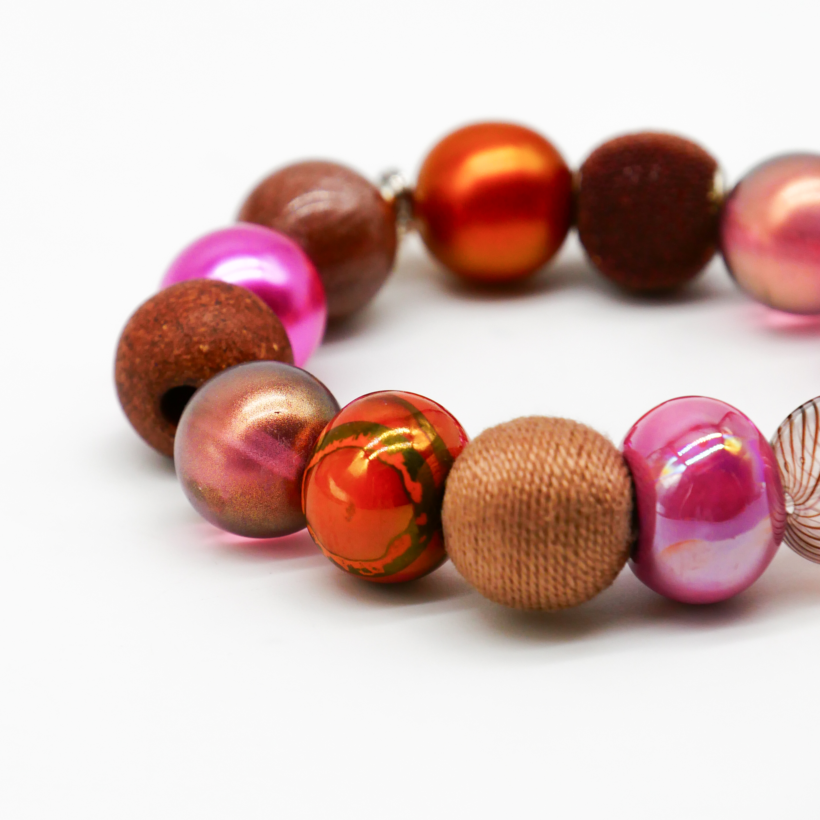  "Bollywood" Armband auf Gummi, braun-pink