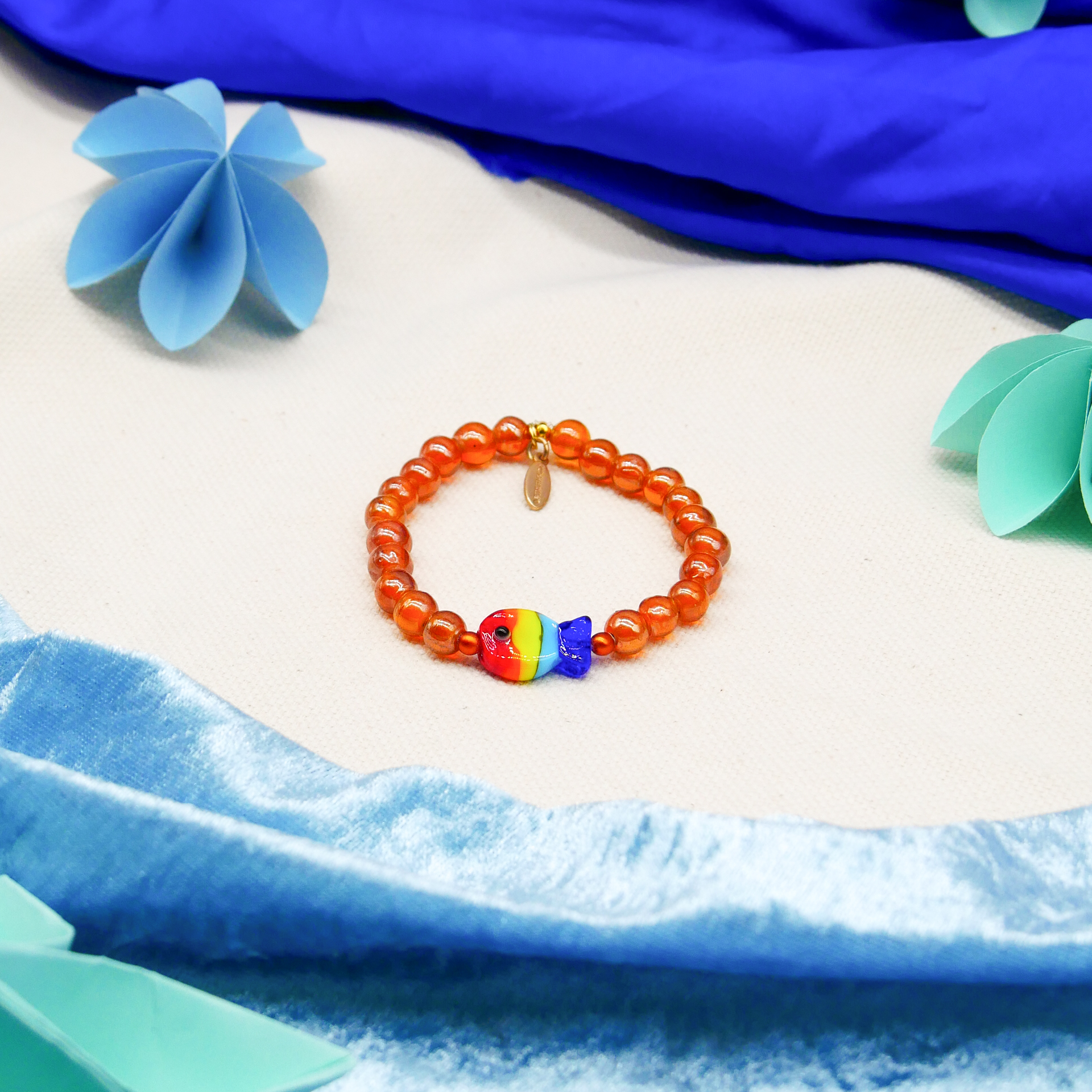 "Summer Feeling" Armband auf Gummi "Fisch" Glasperlen bernstein