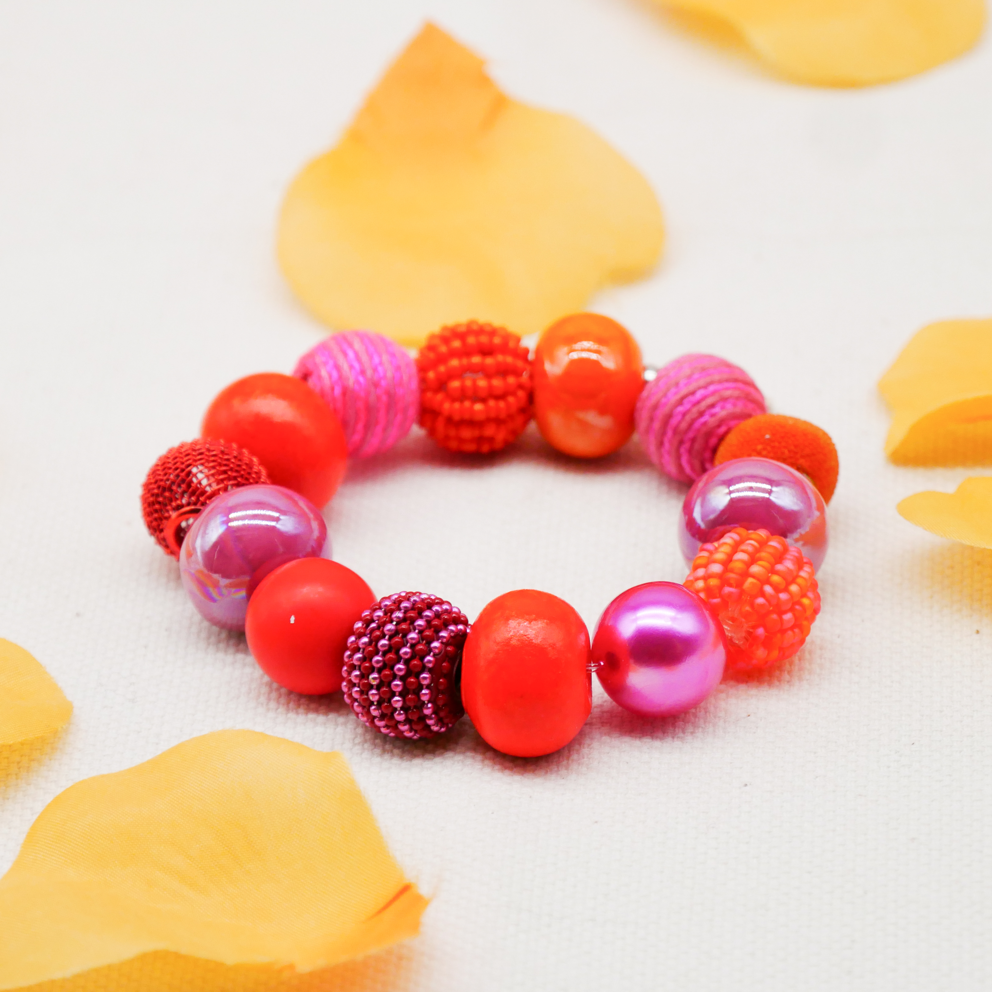  "Bollywood" Armband auf Gummi, pink-orange