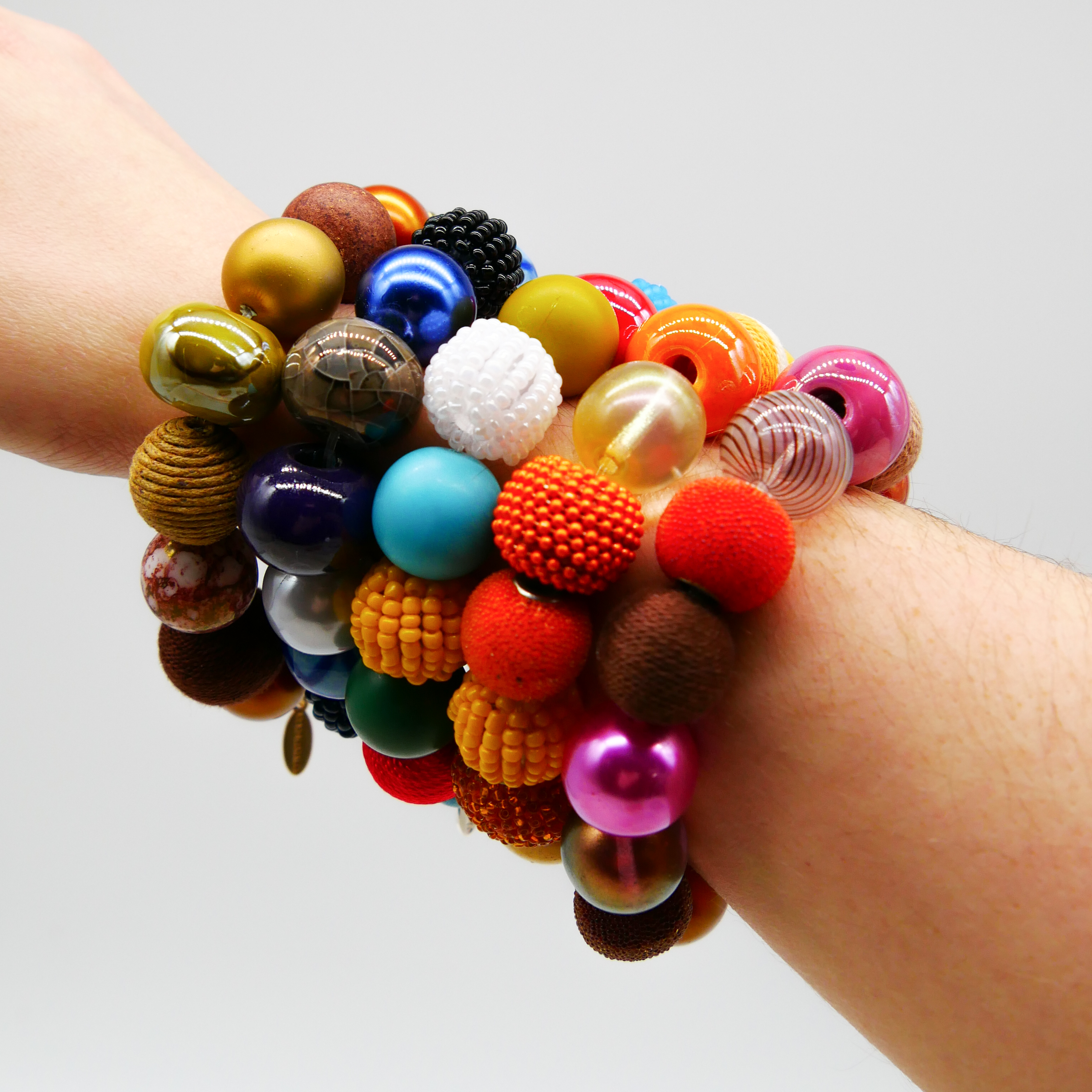  "Bollywood" Armband auf Gummi, gelb-orange