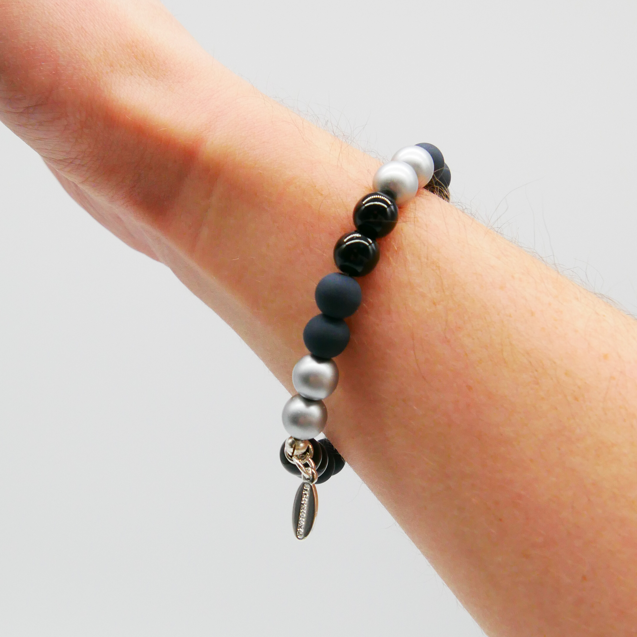  Color Explosion, Armband auf Gummi Ø 8 mm, Glas- und Polaris Perlen, Merkur schwarz-silber