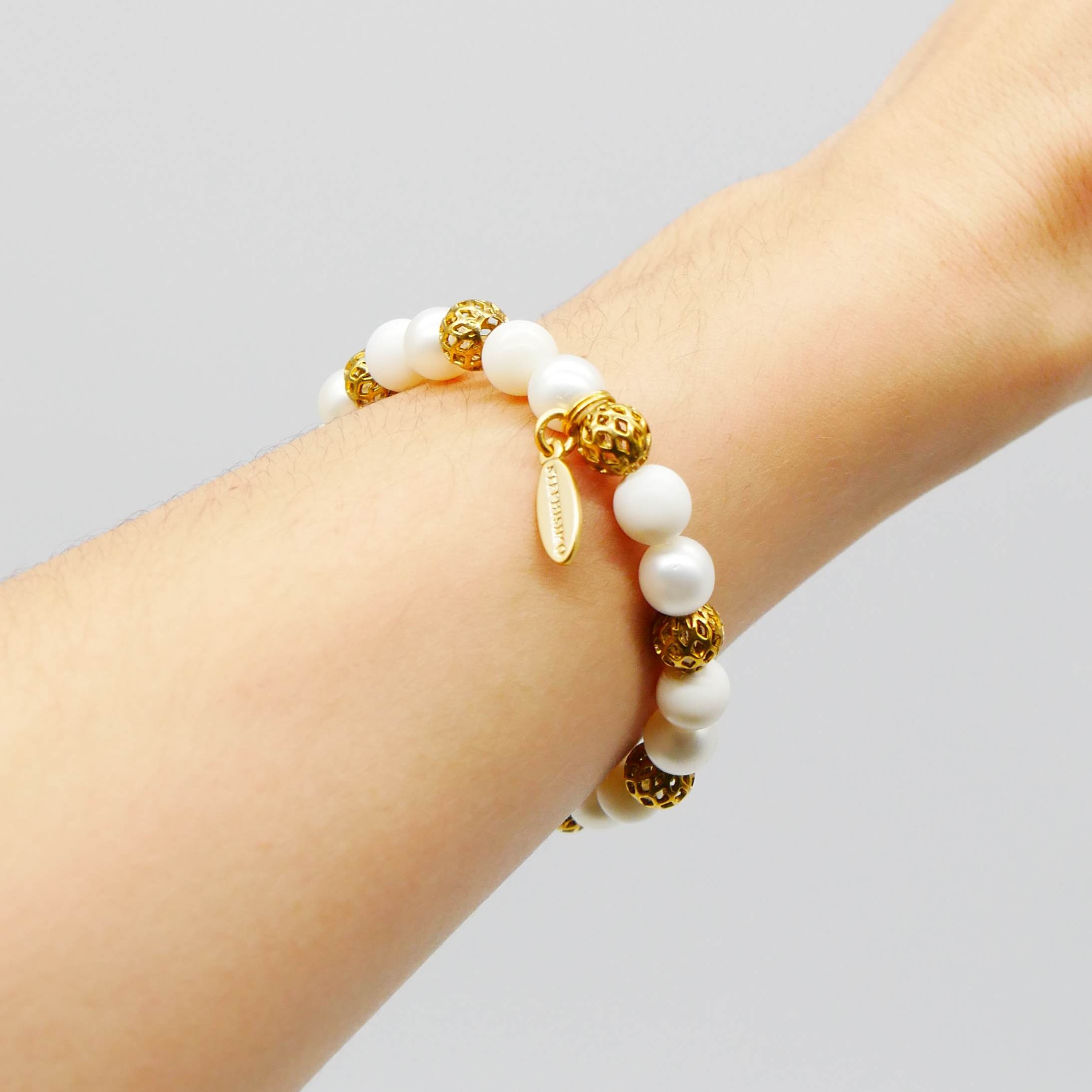  Color Explosion, Armband auf Gummi Ø 8 mm, Glas- und Polaris Perlen, Venus weiß-gold