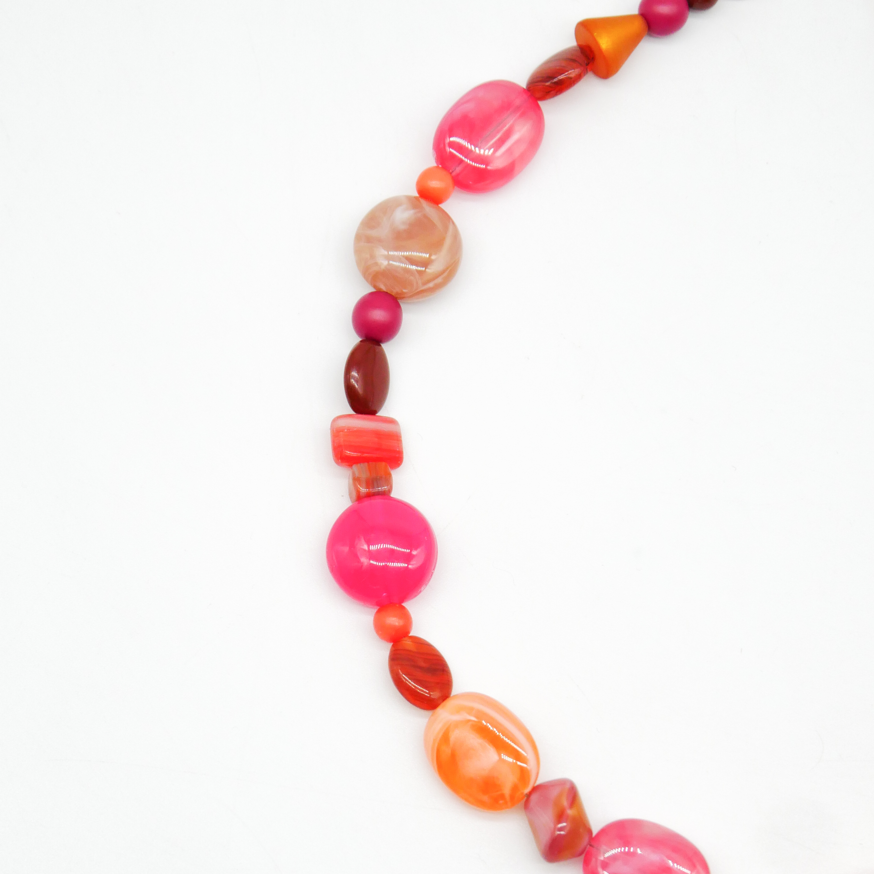 "Summer Feeling",  Chain with different shapes, Glas- and Resin Pearls, pink-orange