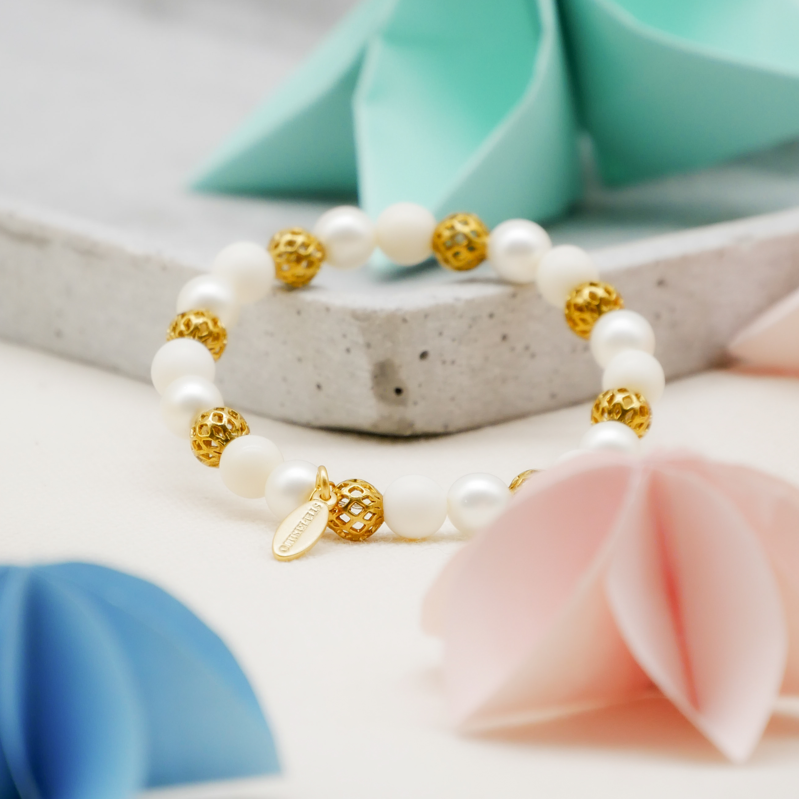  Color Explosion, Armband auf Gummi Ø 8 mm, Glas- und Polaris Perlen, Venus weiß-gold